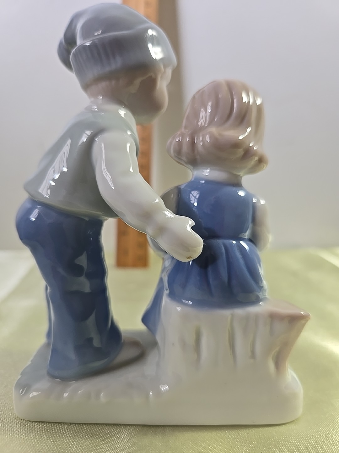 Two Figurines. Boy And Girl Reading. Boy Conductor.