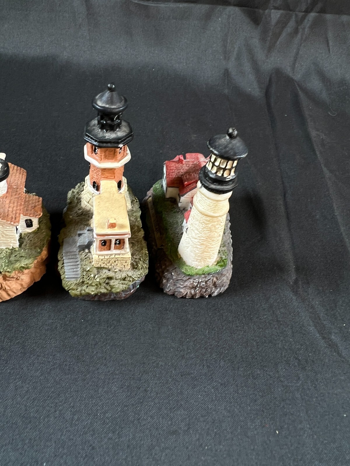 4 collectible vintage lighthouse/house statues 2.25” X 3.0” small decor
