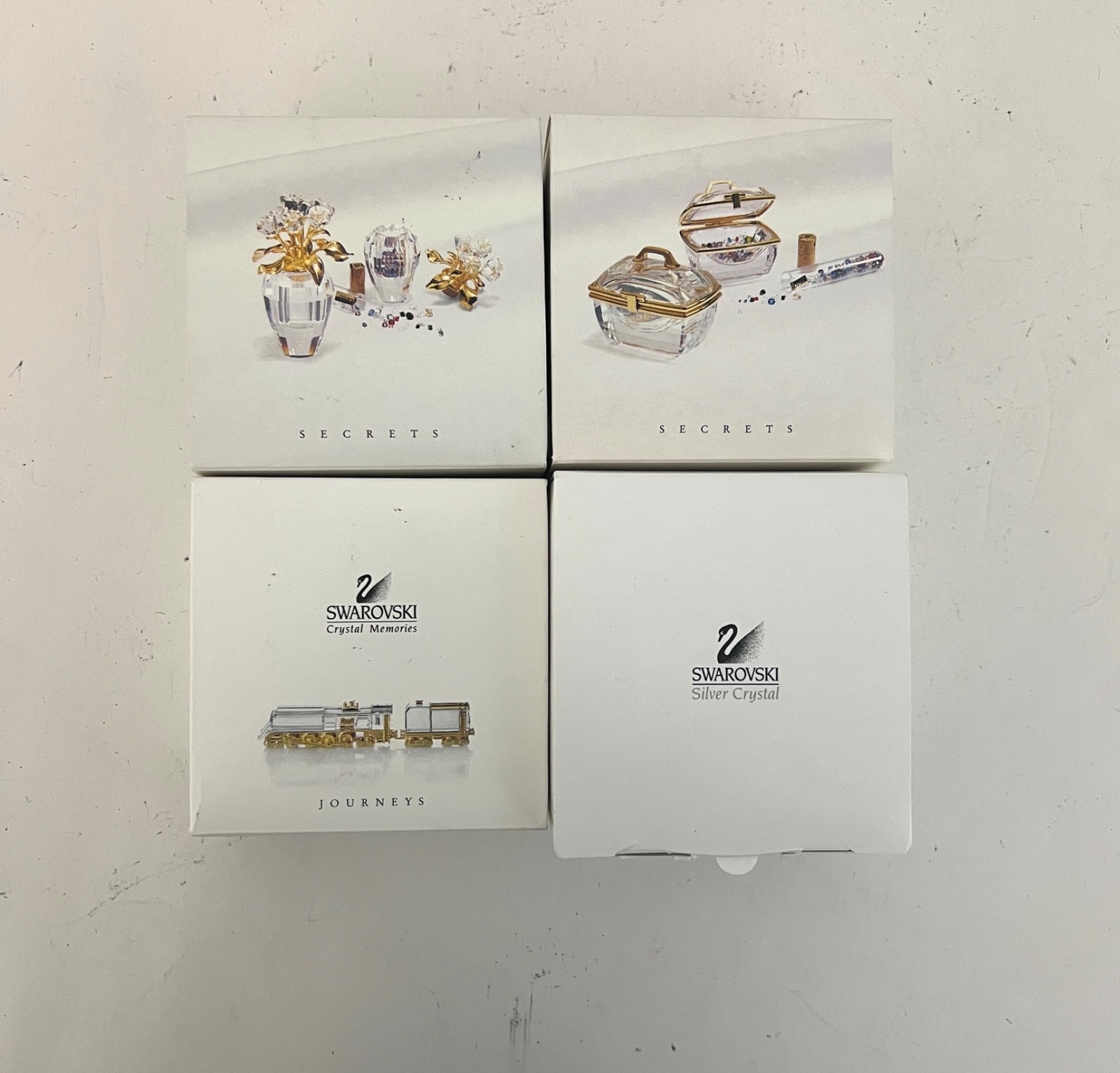 Swarovski 4 Pieces Crystal Miniature Figurines with Gold Accent- Collection # 25