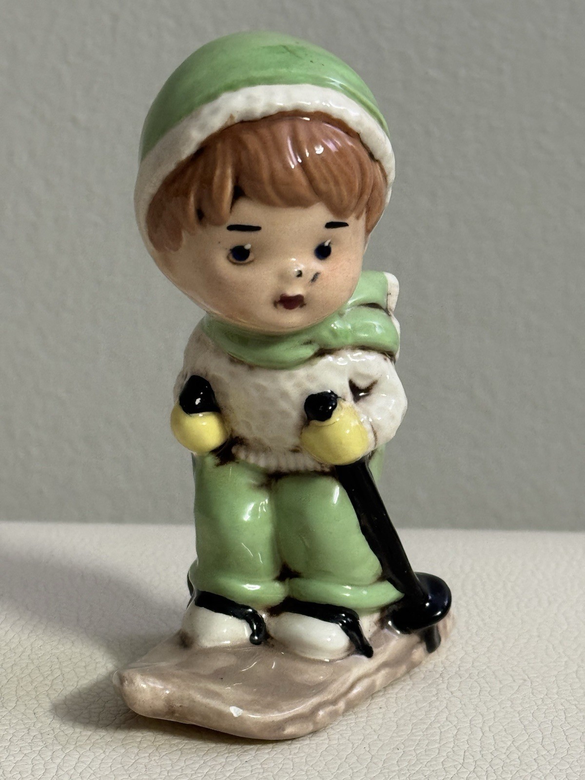 Vintage ceramic figurine, Japan, 1950s Mid-century child skier figurine 4’’