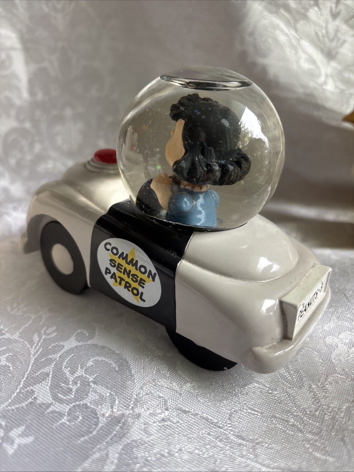 2013 Hallmark Peanuts Gallery Lucy Driving Common Sense Patrol Car Snow Globe