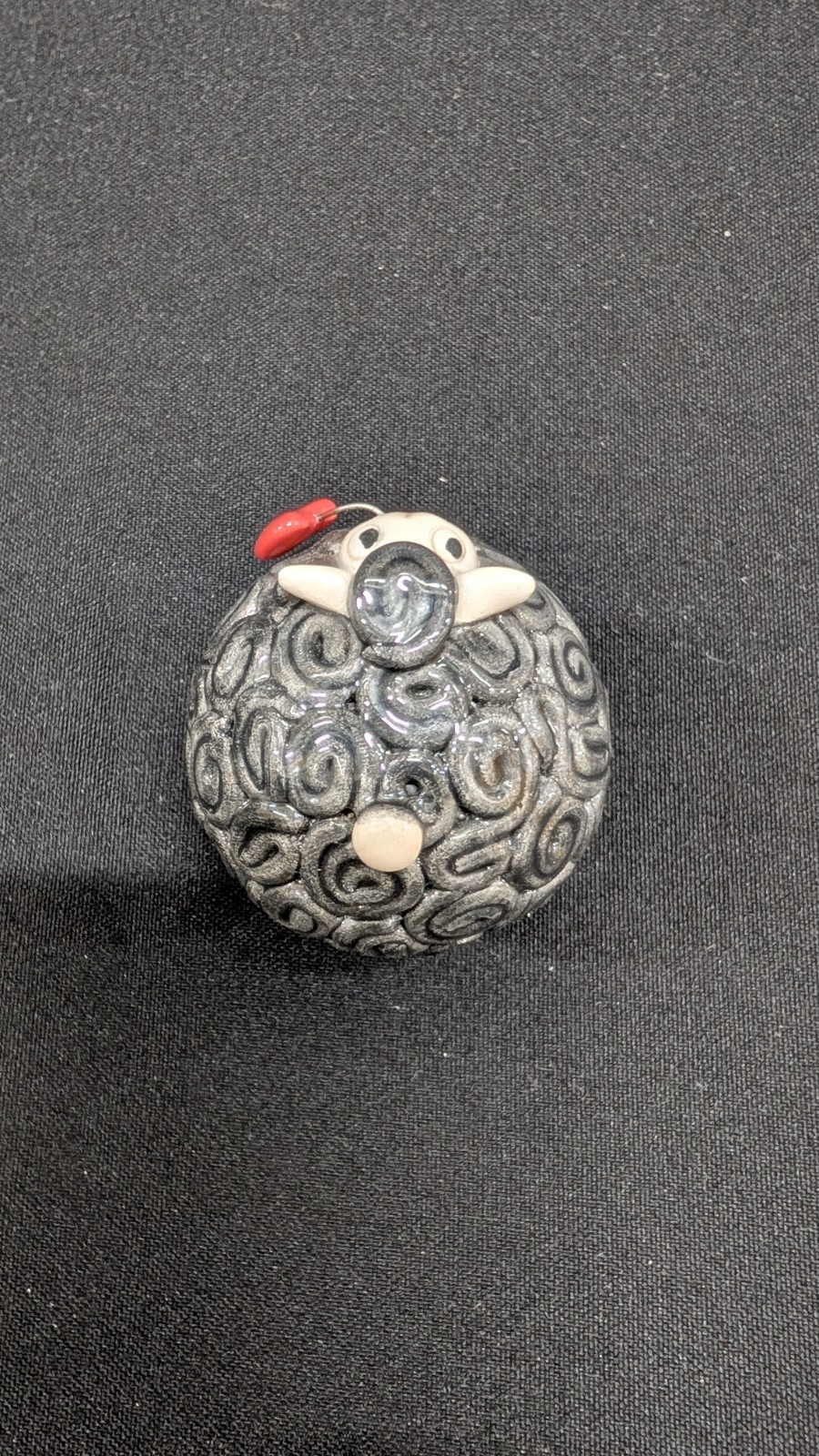 Handmade Black Ceramic Sheep figurine with a Red Heart and Metal Legs