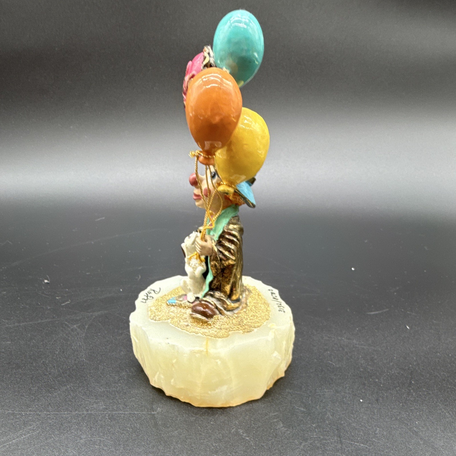Ron Lee signed hand-painted clown figurine with balloons on stone base, 1987