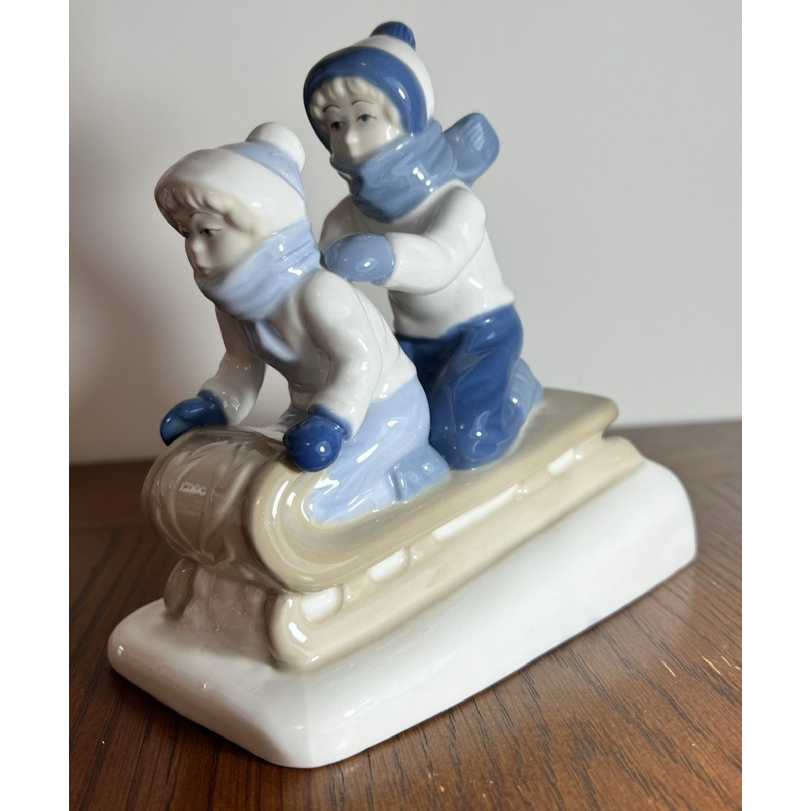 Paul Sebastian Porcelain Figurine Two Children Sledding Winter Scene 1992