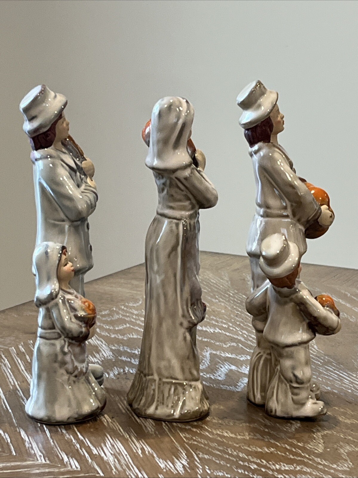 Thanksgiving Porcelain Figurine Pilgrim Family Holding Pumpkin Corn 7” Set Of 3