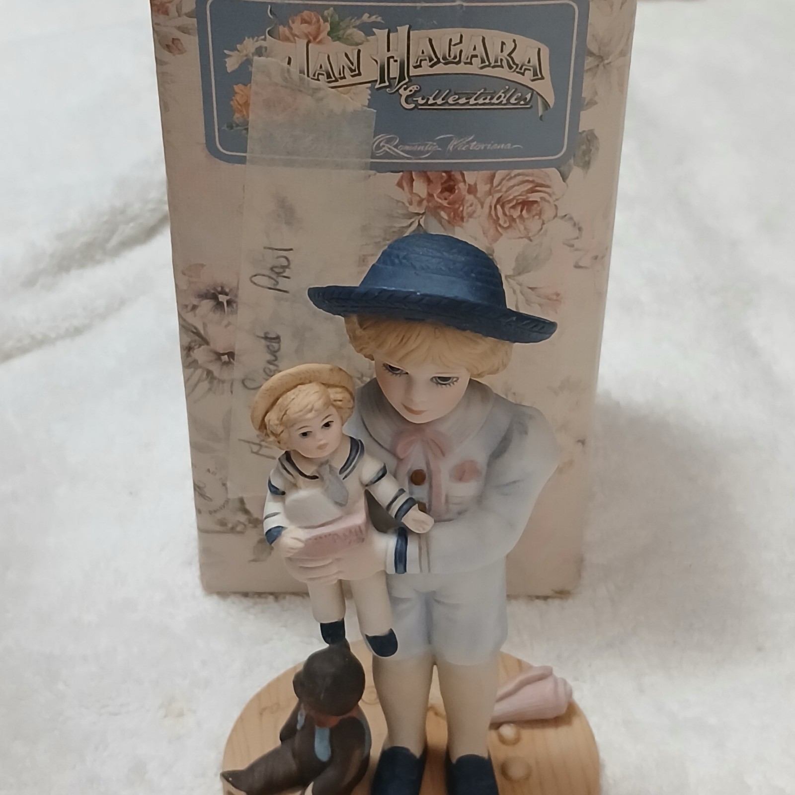 Royal Orleans “Paul” By Jan Hagara Figurine Sailor Boy Holding a Sailor DollRead
