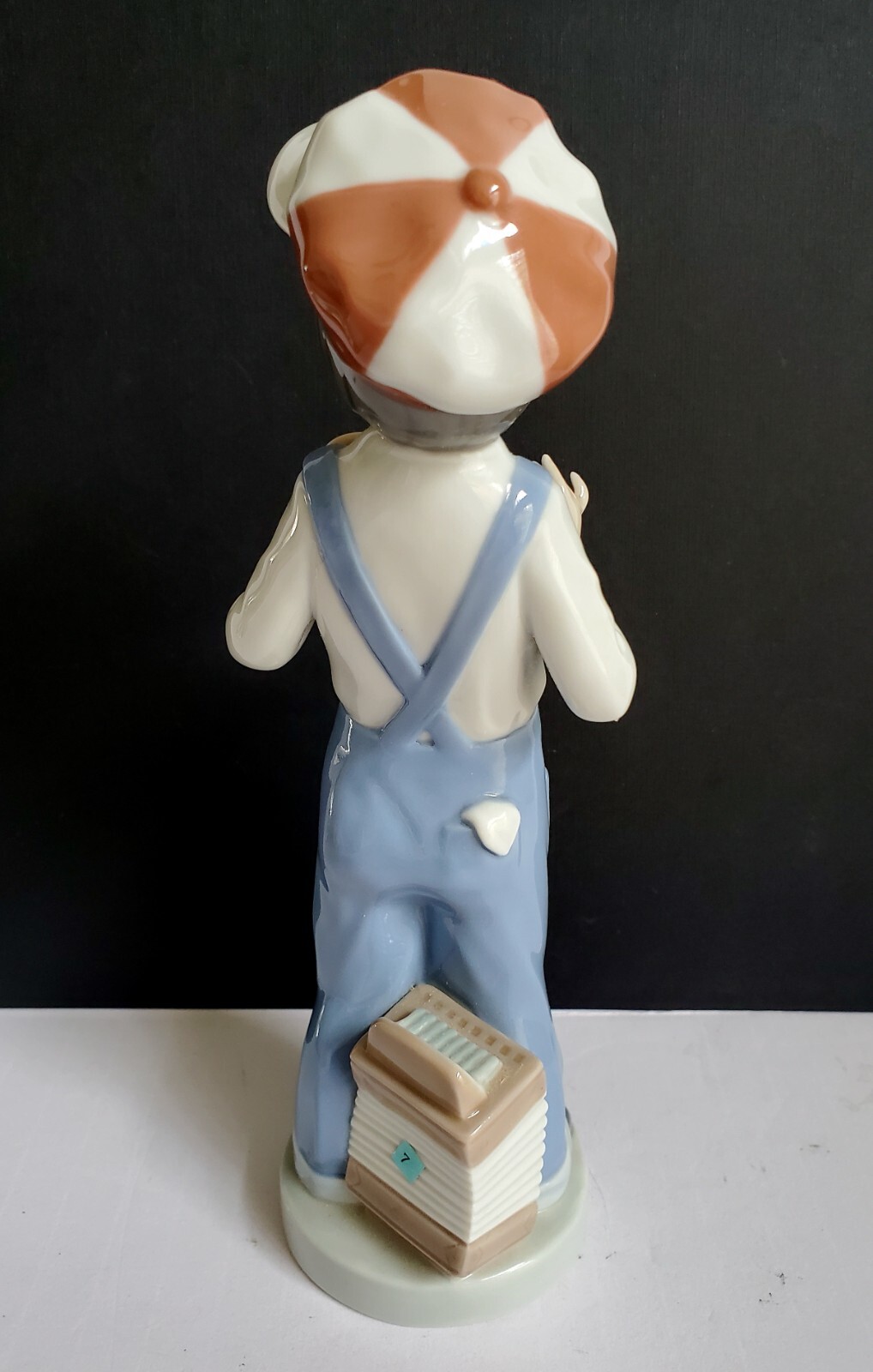 LLADRO Porcelain Boy From Madrid – 8.5″ Boy in Overalls with Accordion #4898