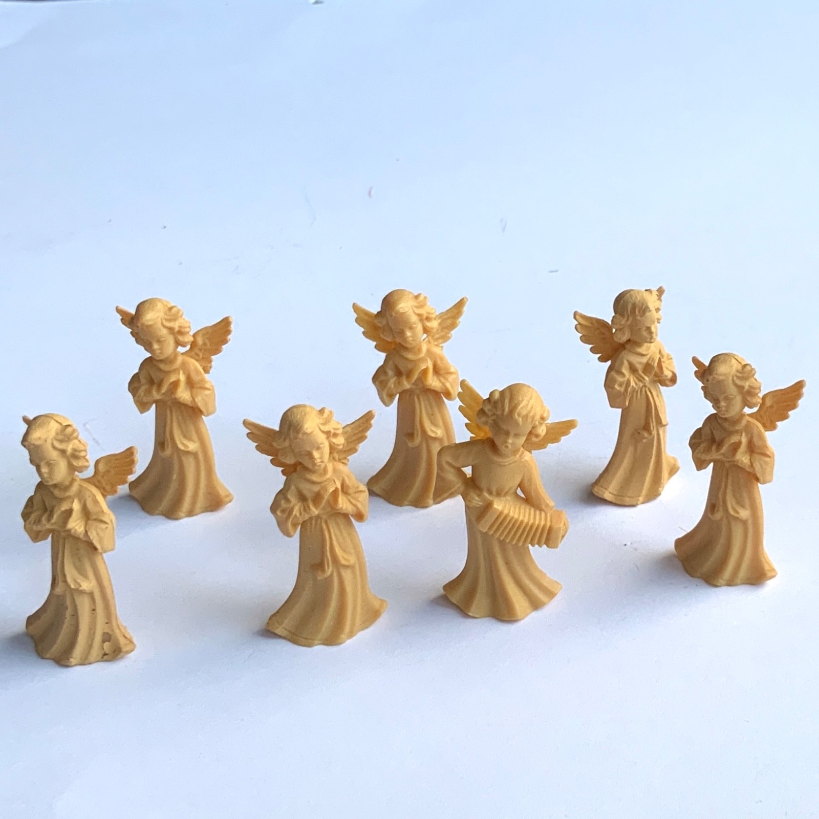 Vtg Germany Set of 7 Beige Hard Plastic Angel Figurines Christmas 1 3/8”