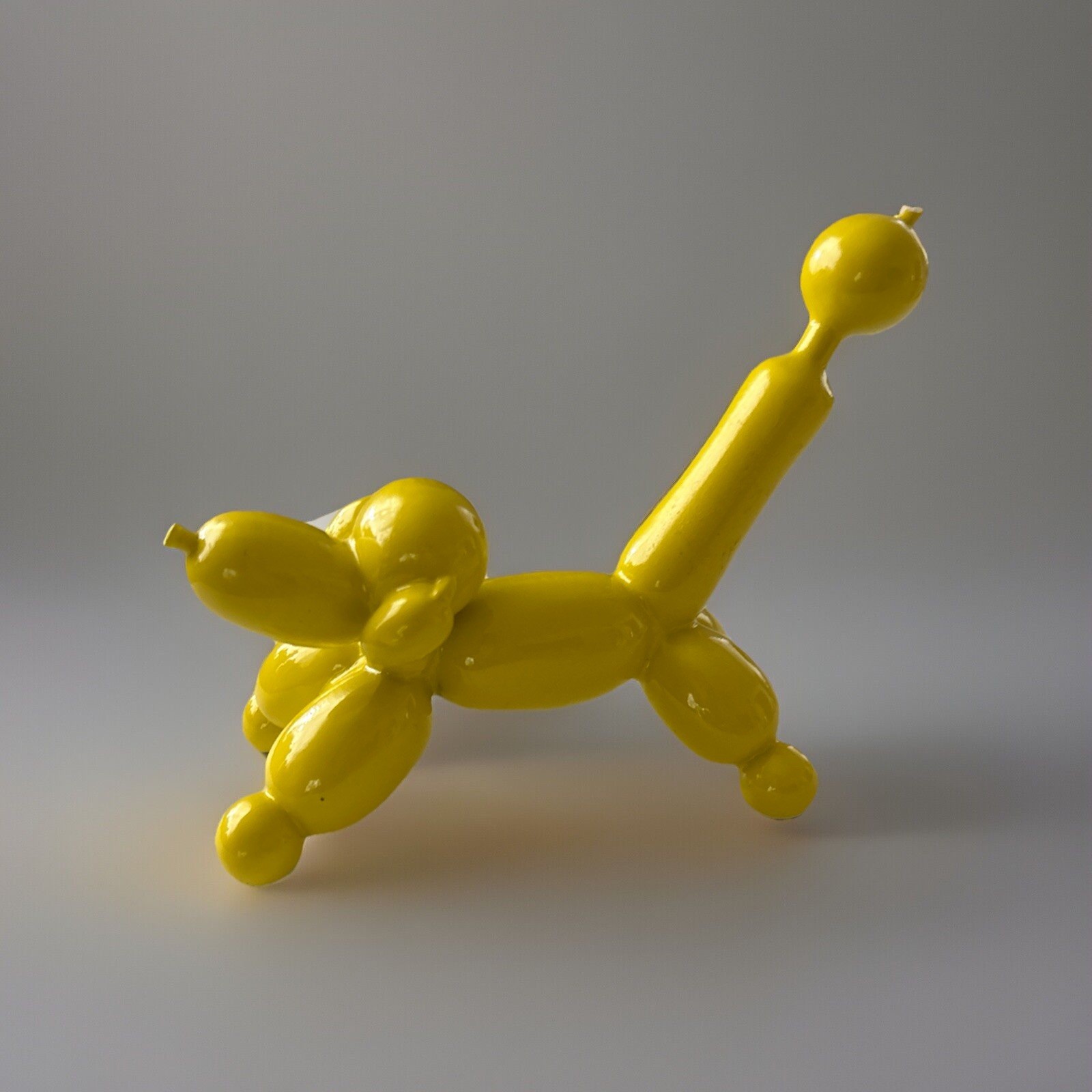 THREE HAND CORP RESIN BALLOON DOG FIGURINE IN ORANGE 6,5”