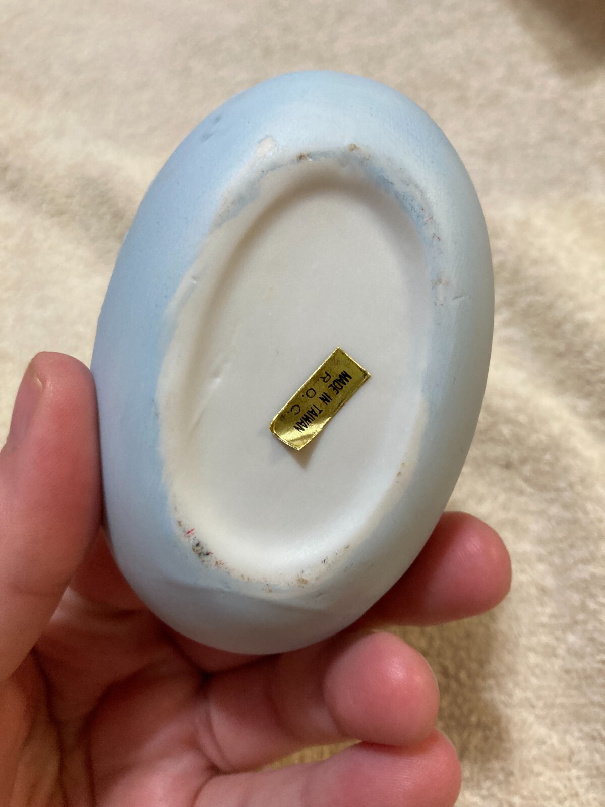 White Rabbit Holding onto Yellow +Green Egg 2 piece Egg that is Blue (Flawed)