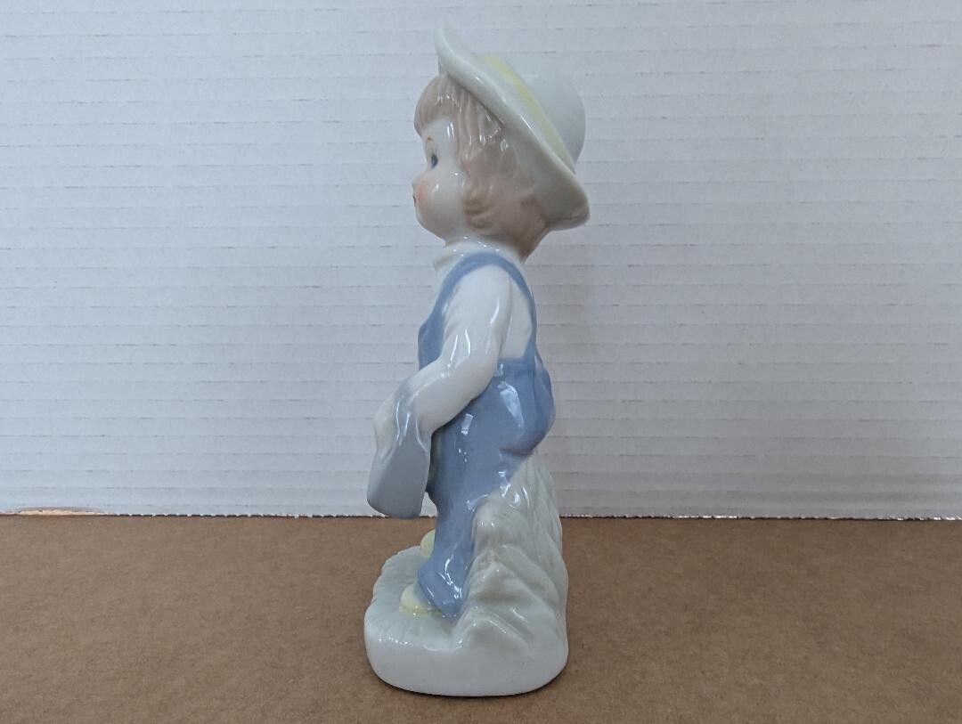 Vintage Girl Figurine Porcelain Girl with Purse wearing Overalls