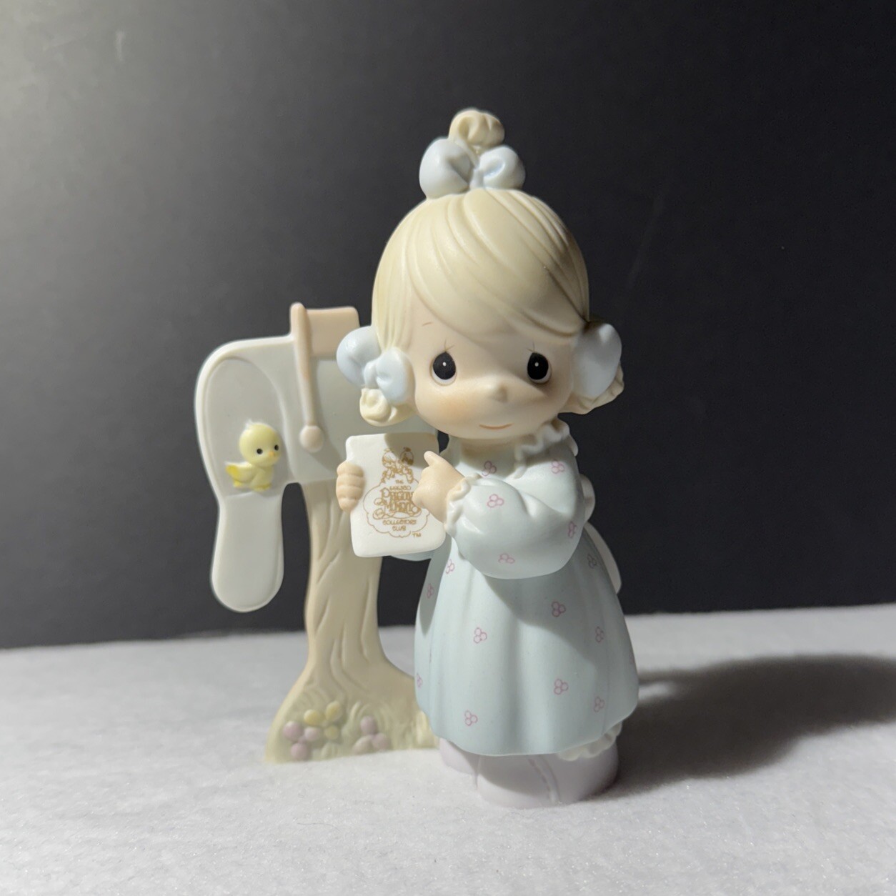 Precious Moments Figurine – Sharing The Good News Together -1991 Symbol Member..