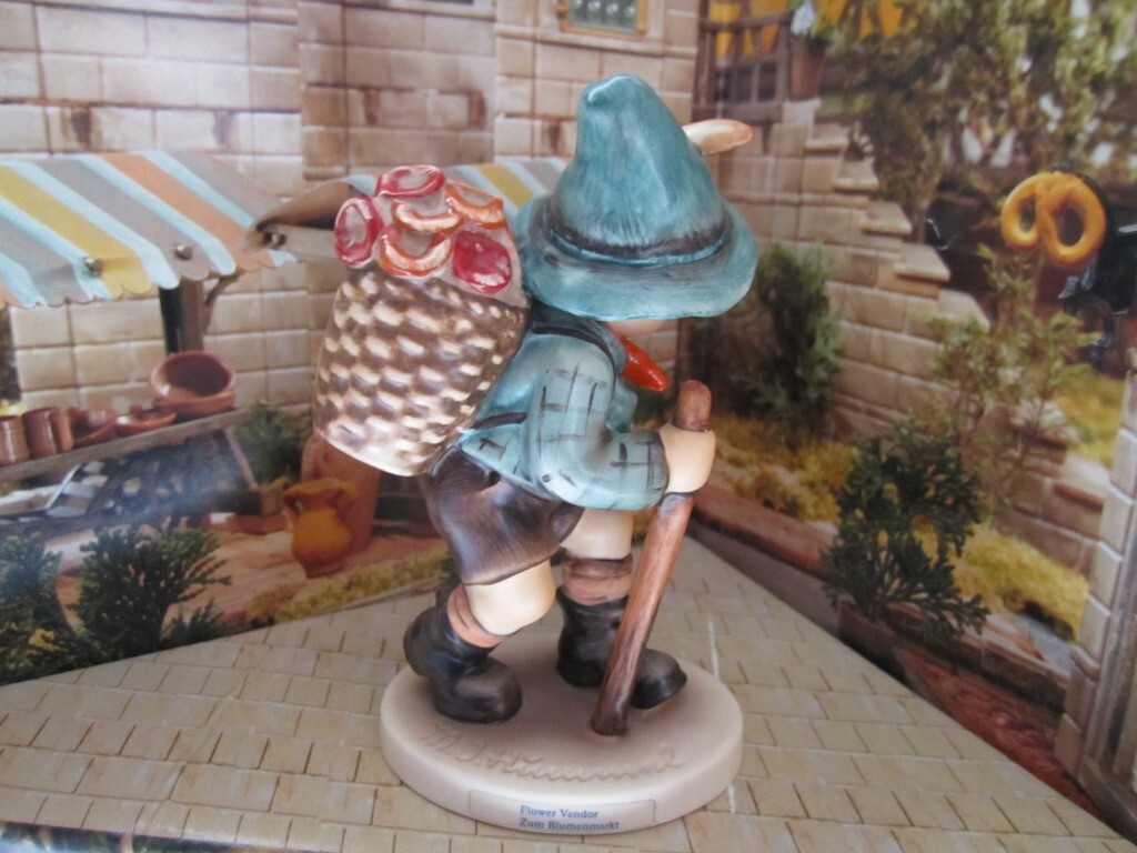 Goebel Hummel “FLOWER VENDOR” #381 5.25″ tall TMK6 W.Germany Excellent Shape