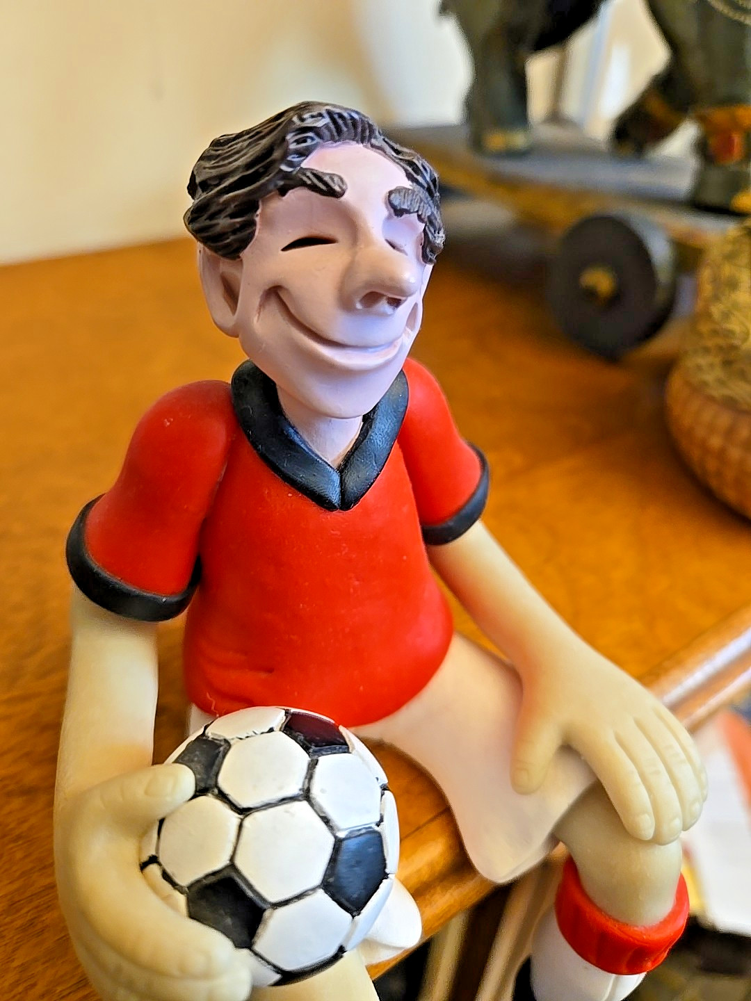 Edge Sitter Figurine • Soccer Player • Handmade Clay Composite – D. Manning