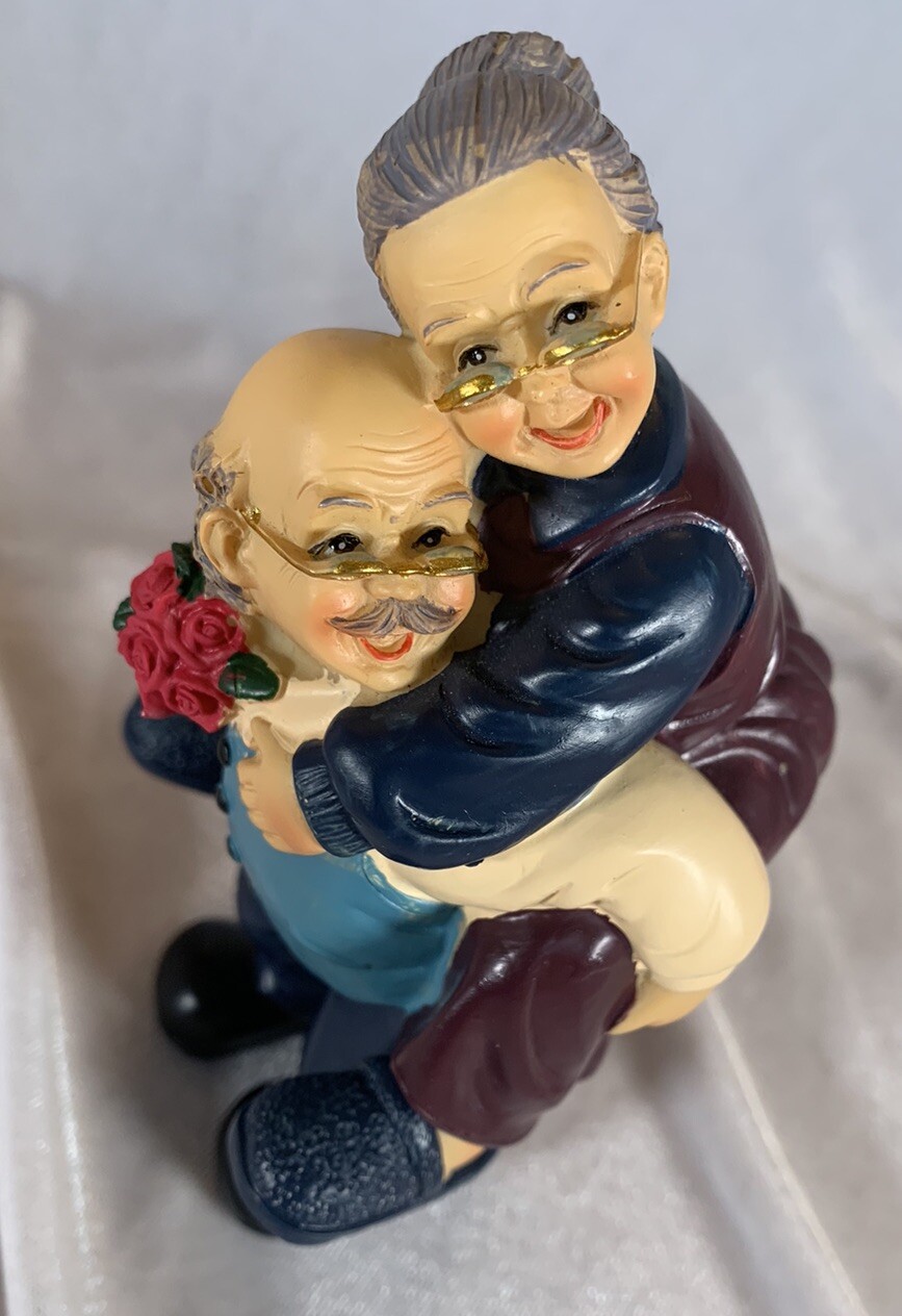 Grandparents Figurine, Grandpa Giving Grandma A Piggy Back Ride!