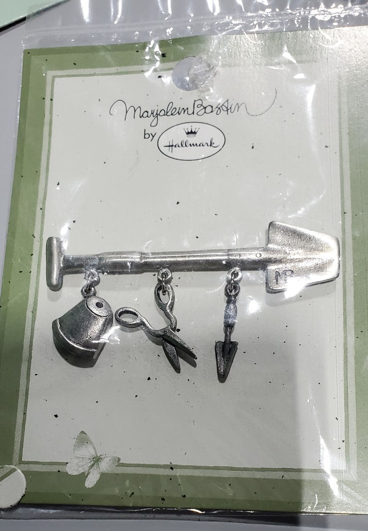 Hallmark Marjolein Bastin Lapel Pin.. Shovel with Charms