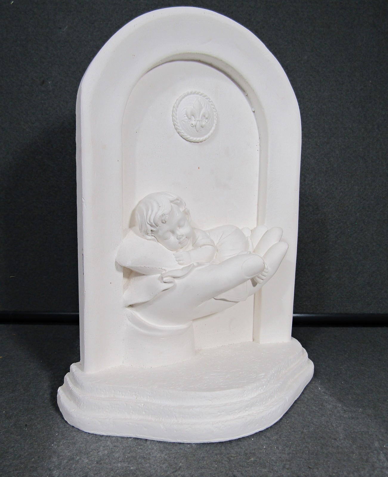 Sleeping Baby in Guardian Hand White Plaster Statue Freestanding 10”