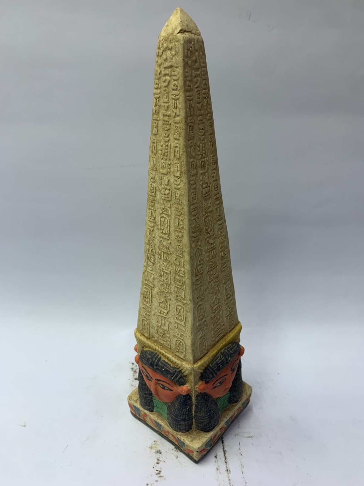 Ancient Egyptian Obelisk Statue with Hieroglyphs and Pharaonic Bust Hathor