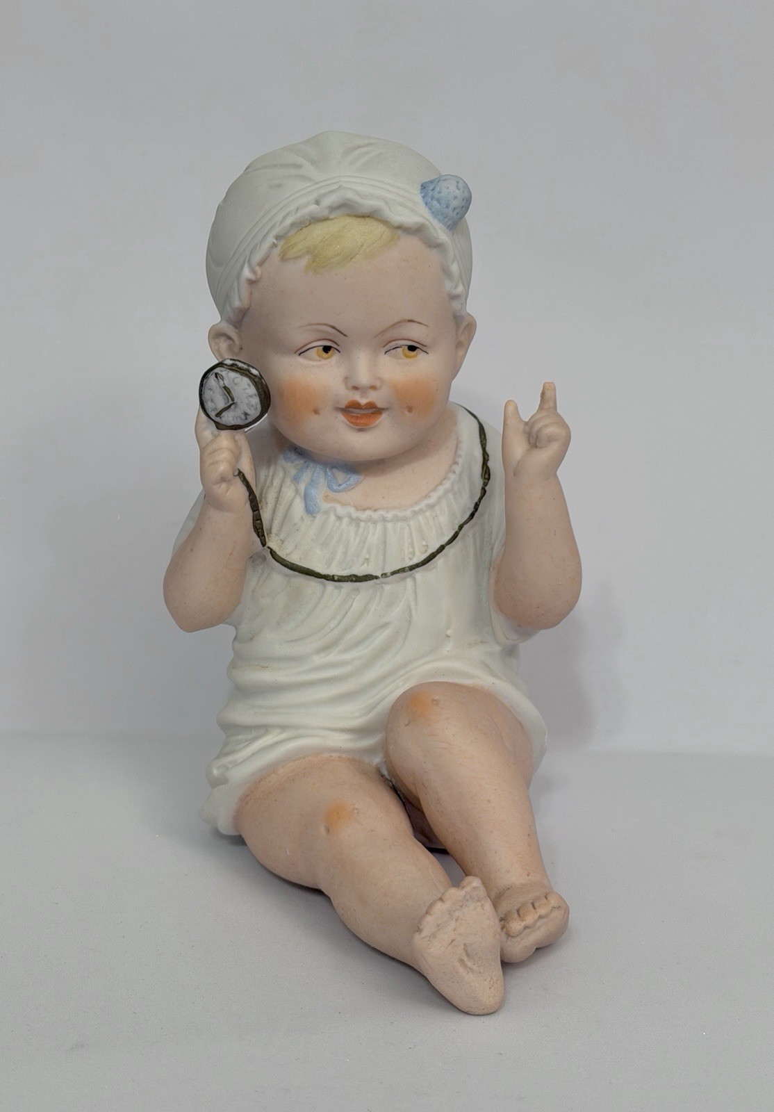 ANTIQUE CARL SCHNEIDER 5″ BISQUE PIANO BABY WITH POCKET WATCH GERMANY 13470 18