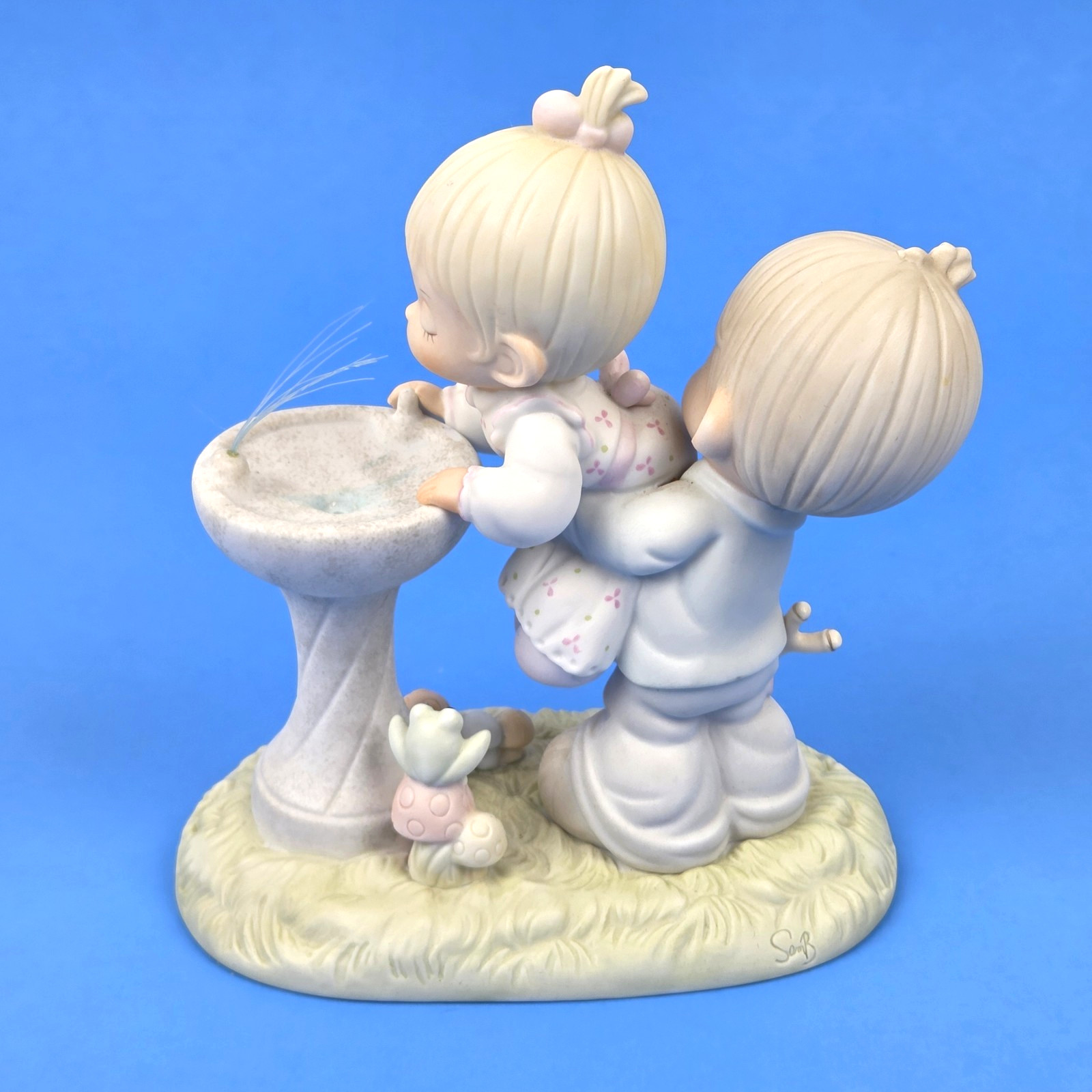 Precious Moments “Your Love Is So Uplifting” Figurine
