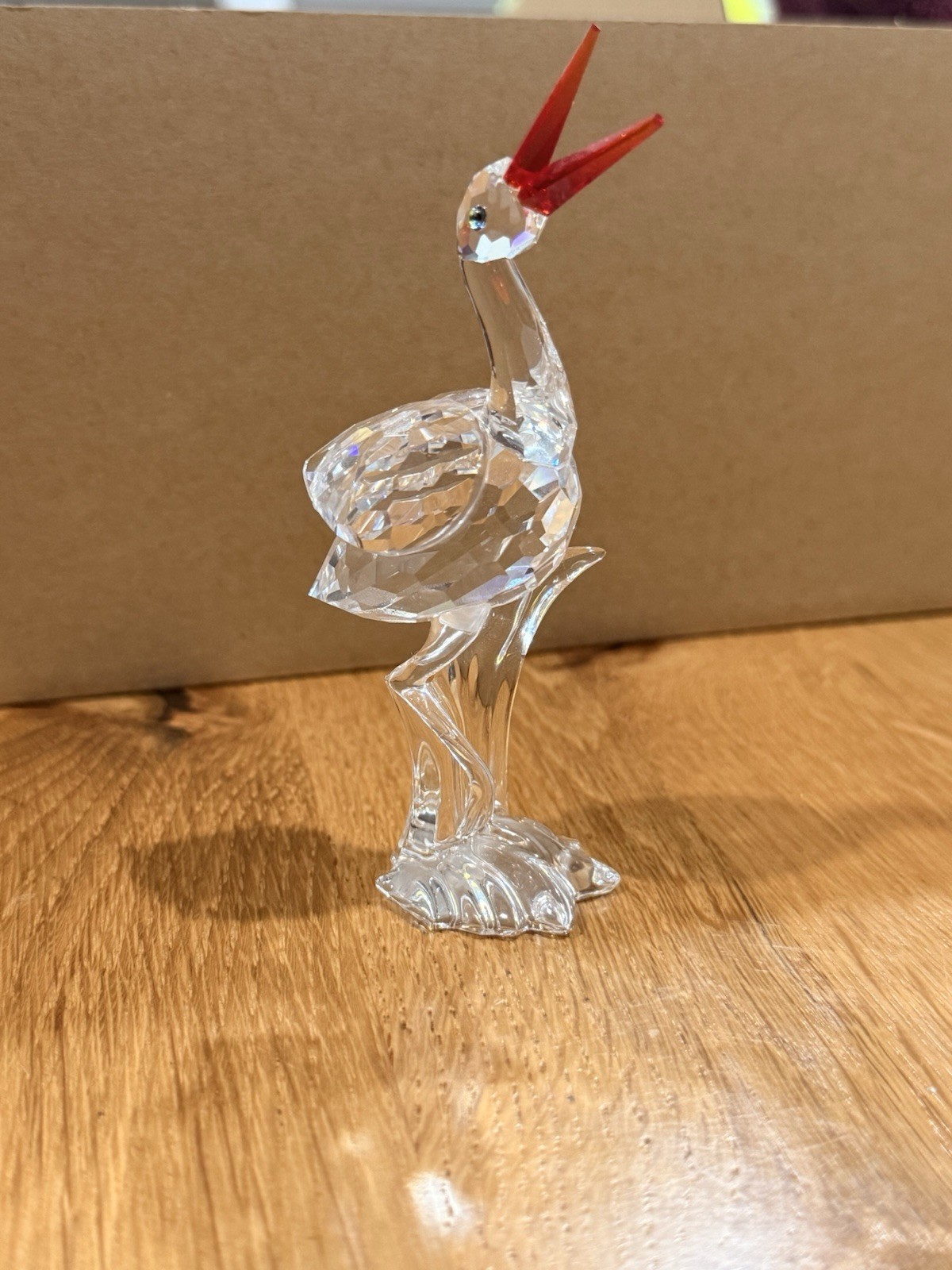 Swarovski crystal wading bird/crane-type figure with a red faceted crest