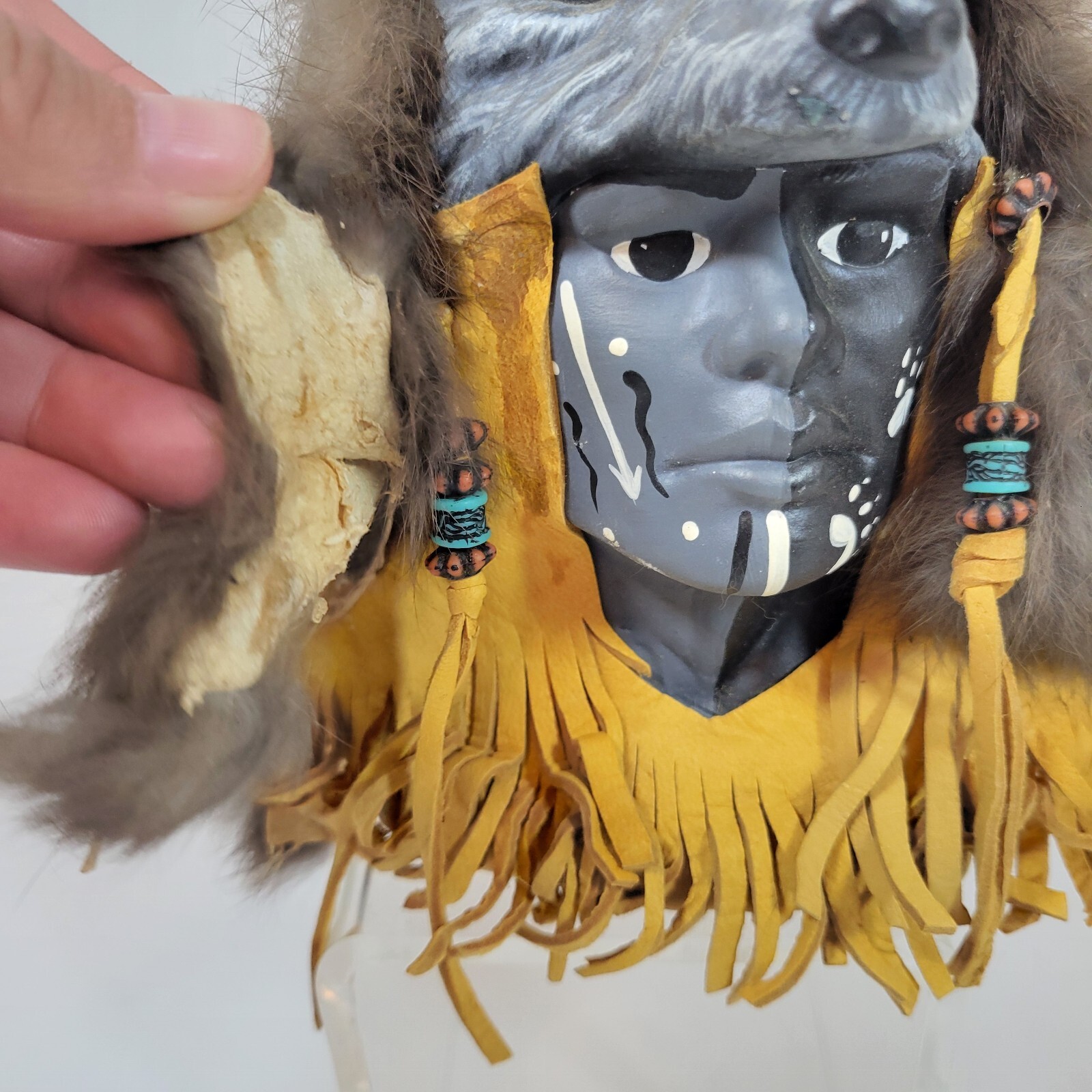 Indigenous tribal bust wolf headdress ceramic fur lining statue leather tassles