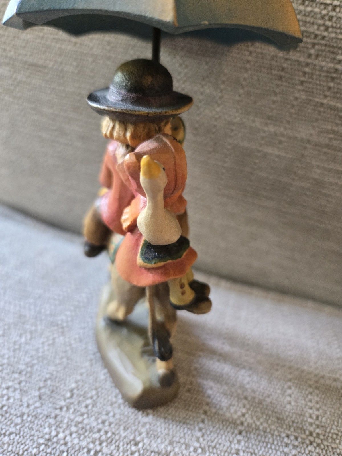 “Riding Through the Rain” Ferrandiz wood carving