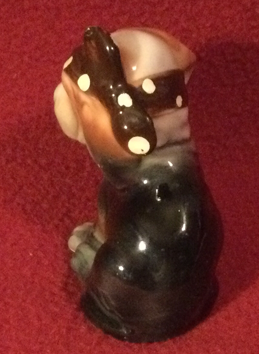 Vintage whisical Ceramic Dog Figurine with head scarf approx. 2.5″