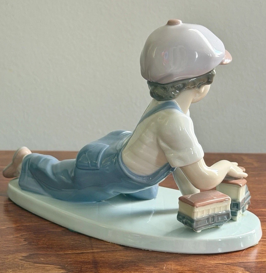 Lladro All Aboard # 7619 Boy with Train Retired Glossy Porcelain Figurine Signed