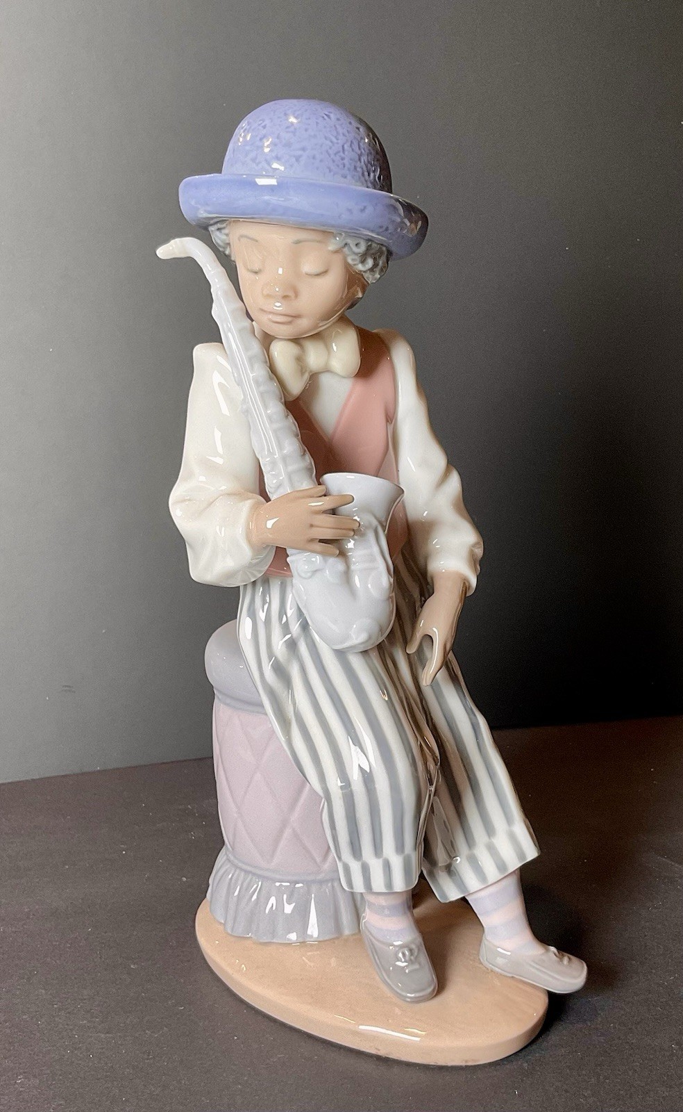 Lladró Jazz Sax #5833 Porcelain Figurine Boy with Saxophone w/ Original Box