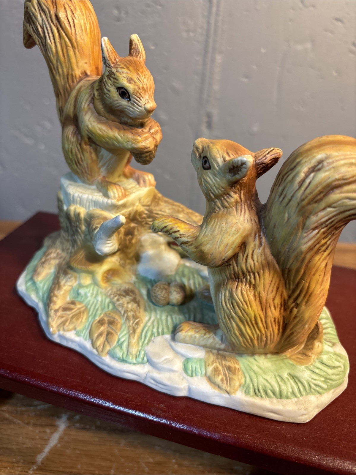 Two Squirrels Gathering Nuts One Squirrel On A Tree Stump