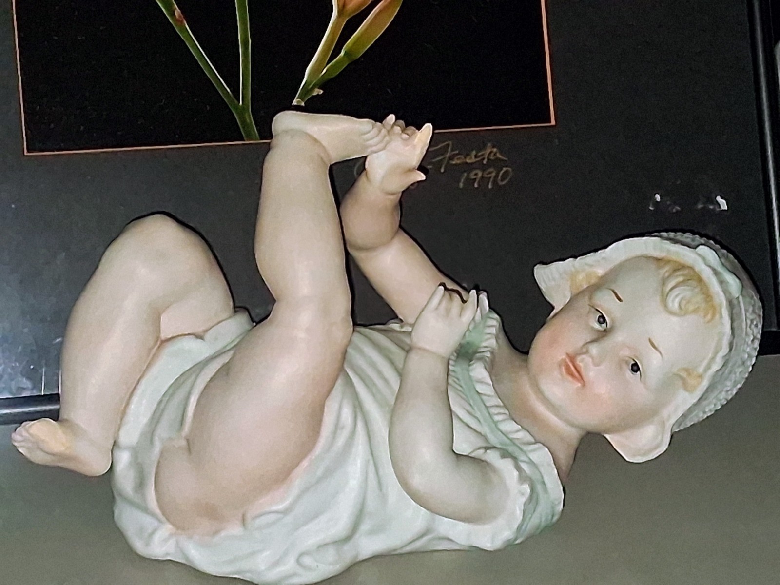 Gebruder Heubach-German Porcelain Bisque-Lying On Back Piano Baby–11″ Length