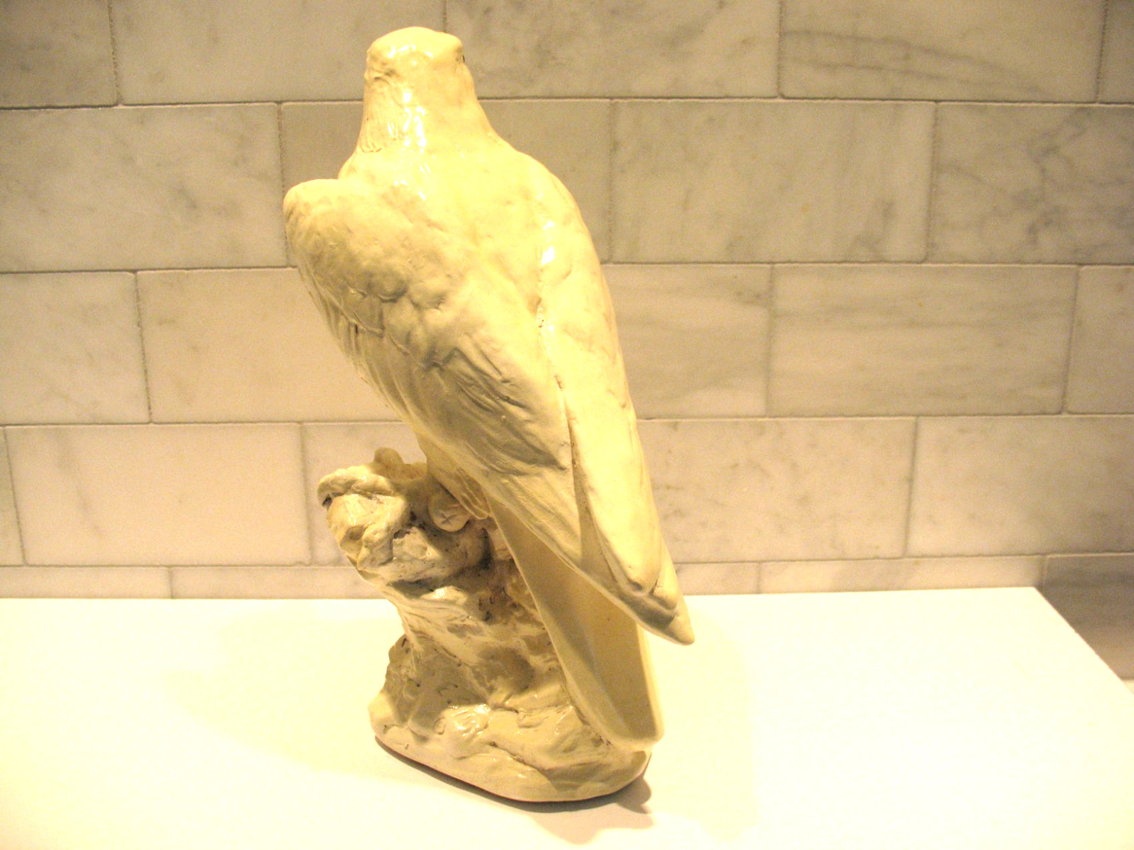 Peregrine Falcon Statue, 1982 by E. Sim, 11 inches tall.