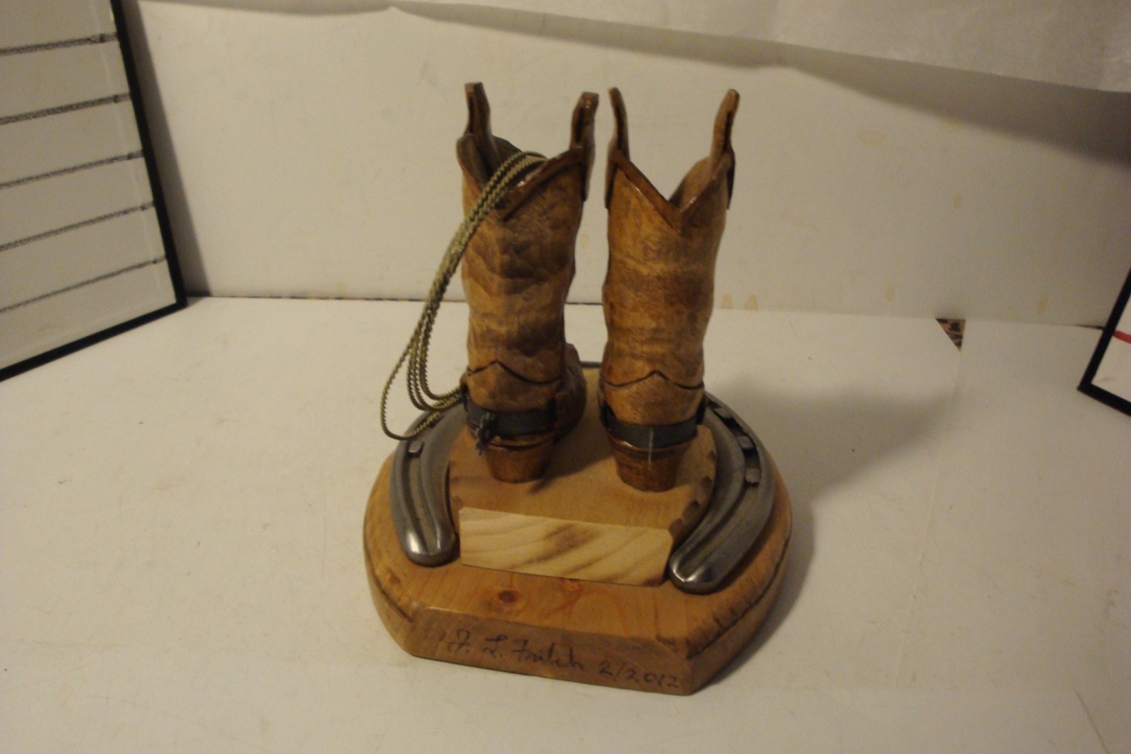 2012 J.L.Fritch wood carving cowboy boots and rope signed dated