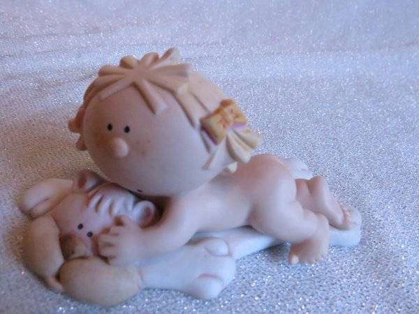 Bumpkins Ceramic Girl Blond Hair Laying on Bear Rug by Fabrizio for George