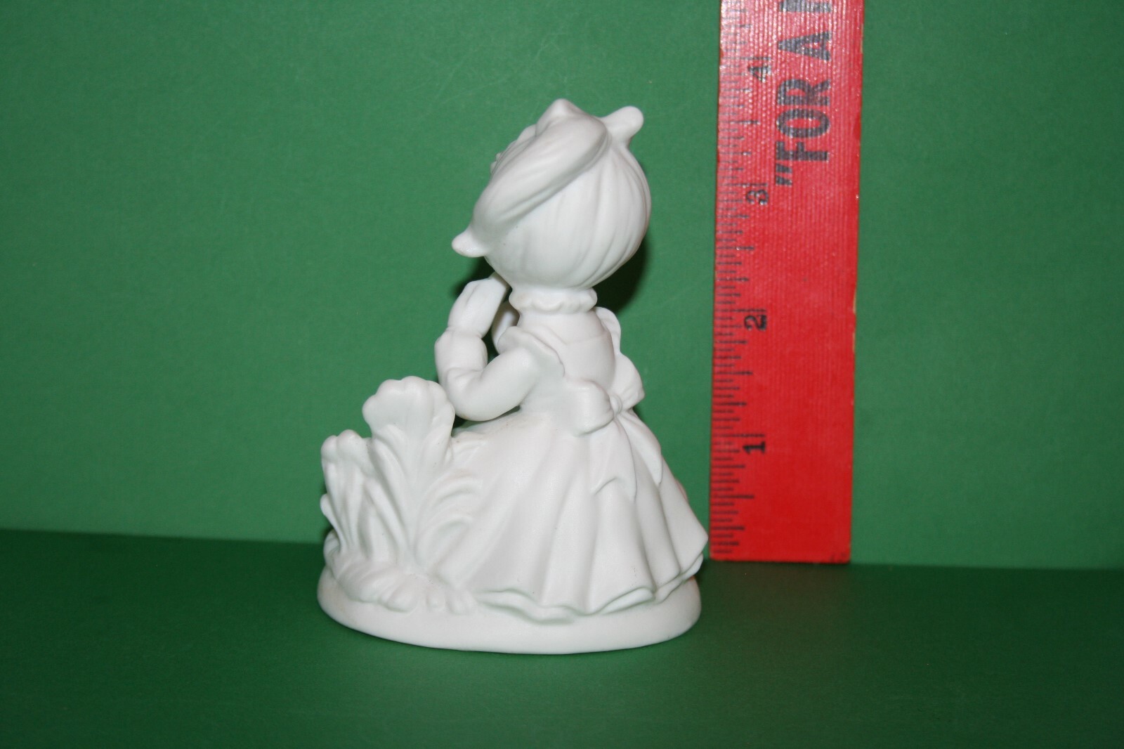 White Bisque Porcelain Girl Figurine Ruffled Dress Bow Powdering Face Flowers