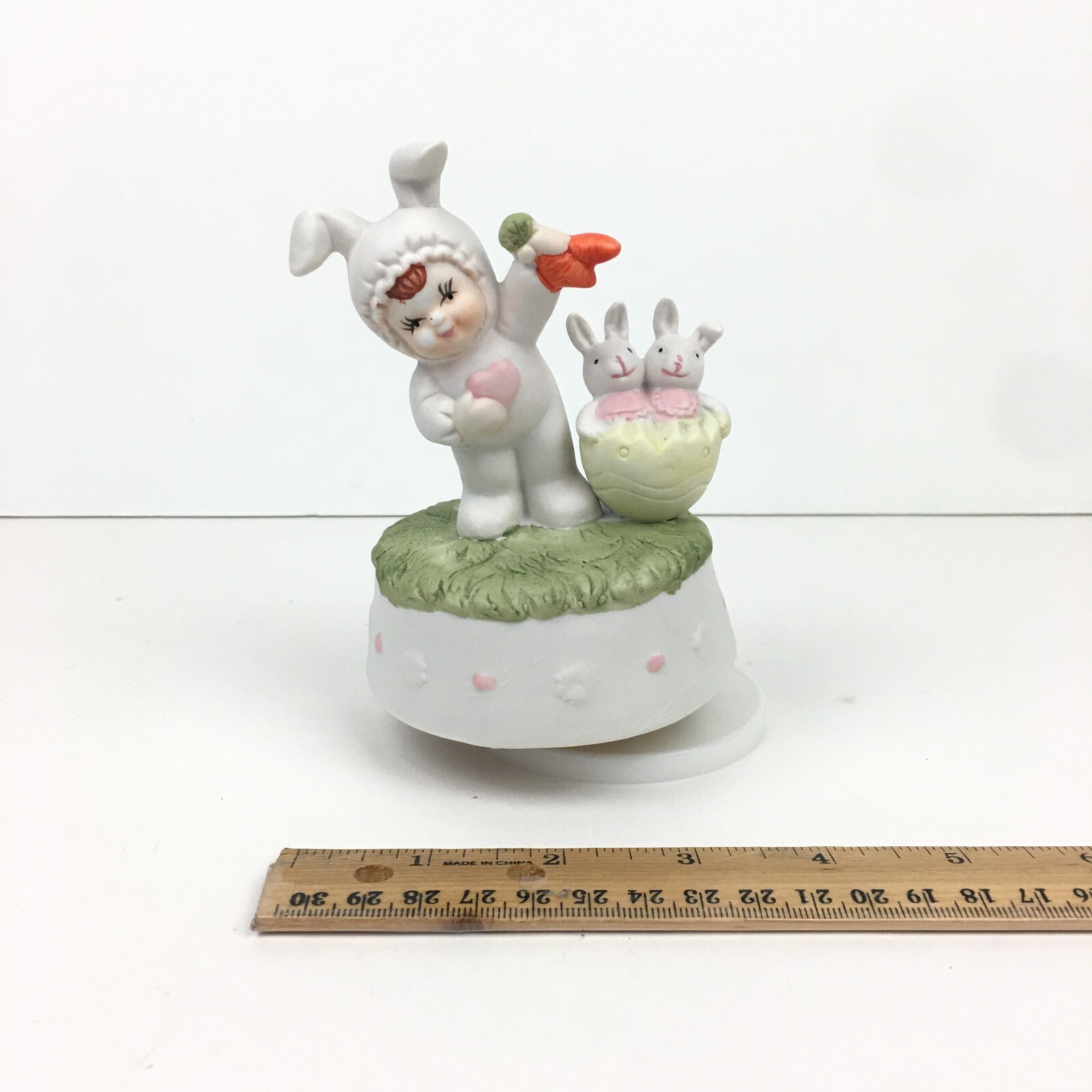 Vtg Easter Bunny Rabbit Holiday Figurine Musical Revolving Child Pastel Colors