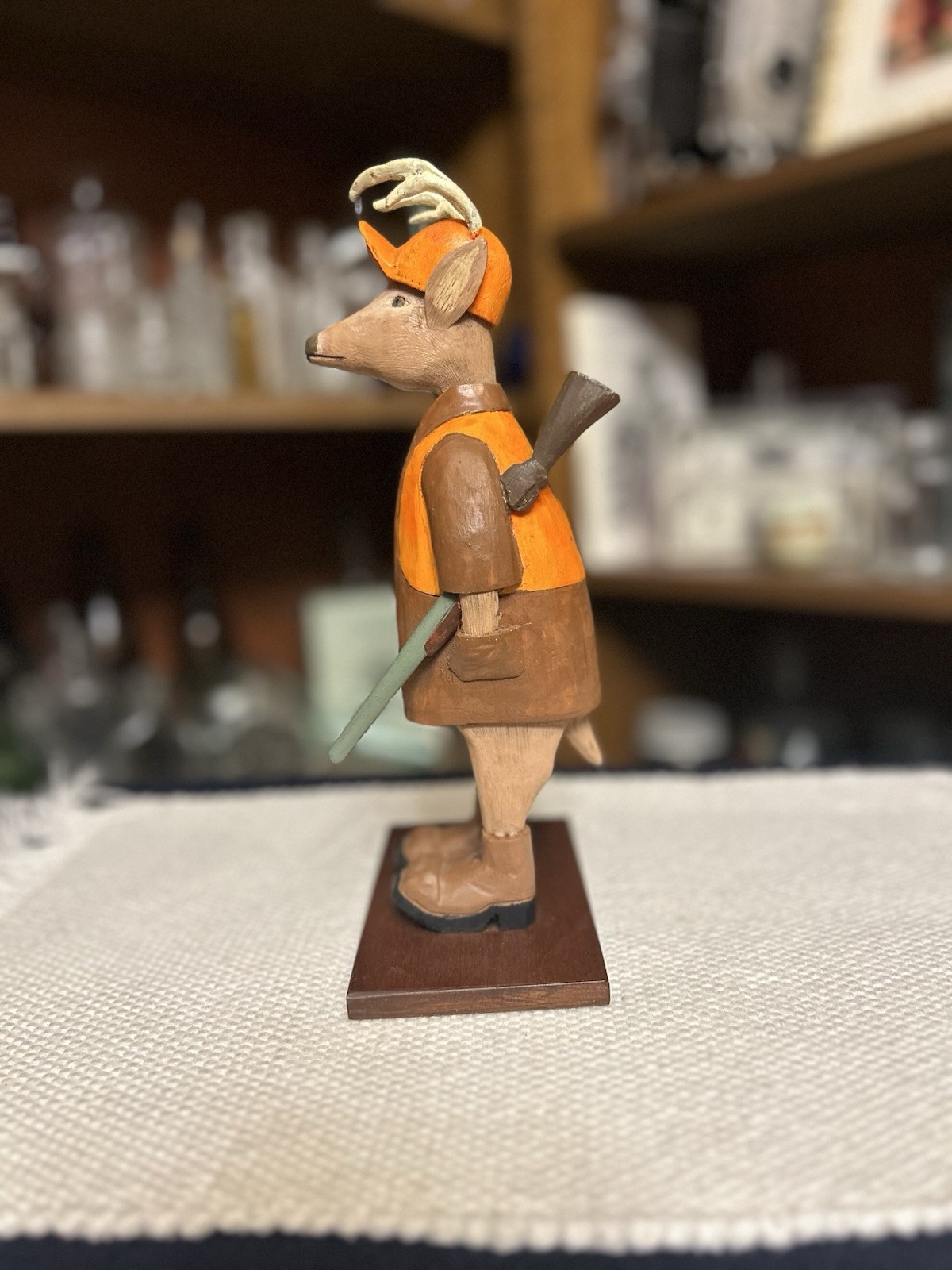 Carved Wooden Deer Figurine Whimsical Whitetail Buck Going Hunting 10”
