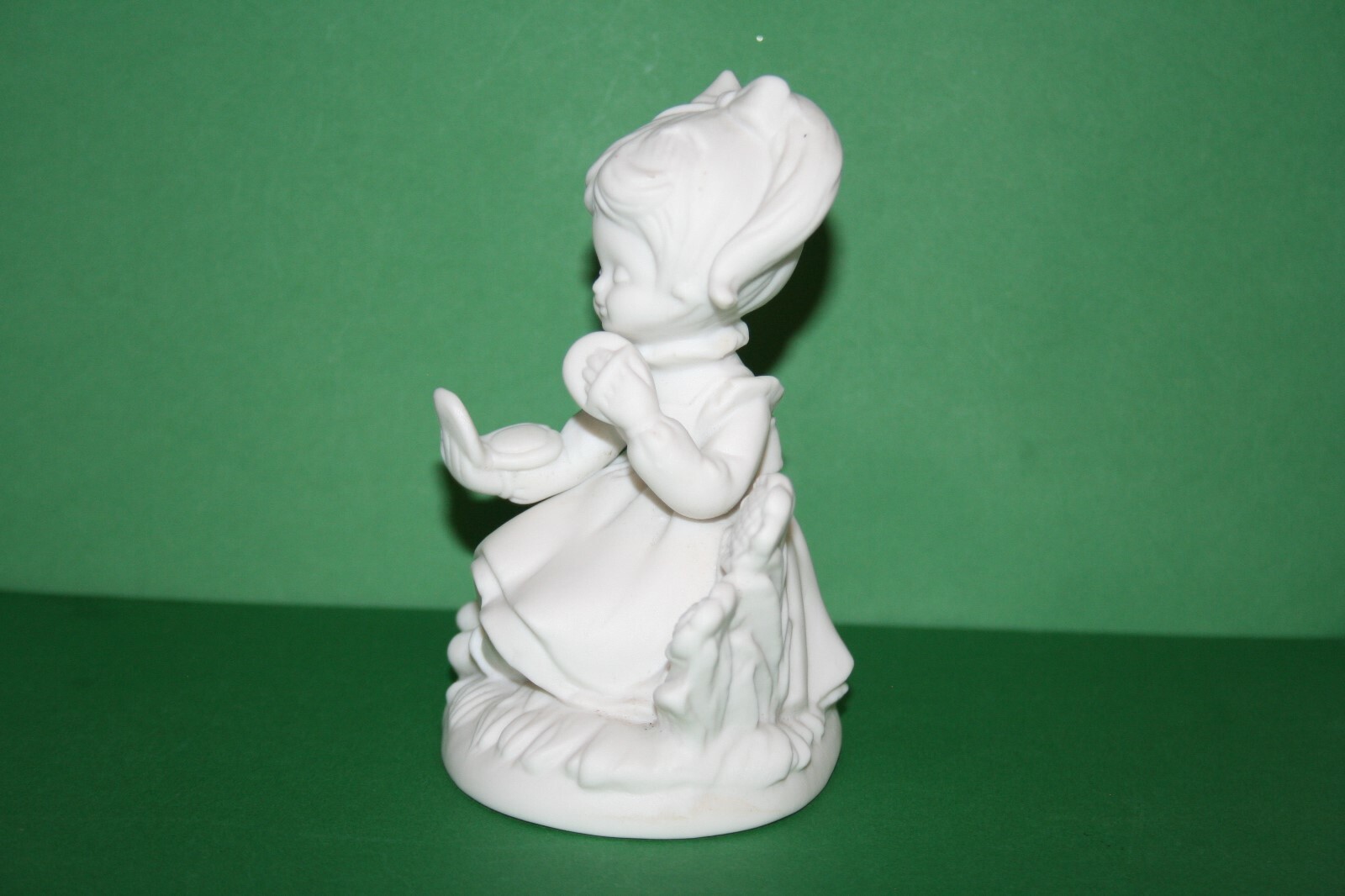 White Bisque Porcelain Girl Figurine Ruffled Dress Bow Powdering Face Flowers