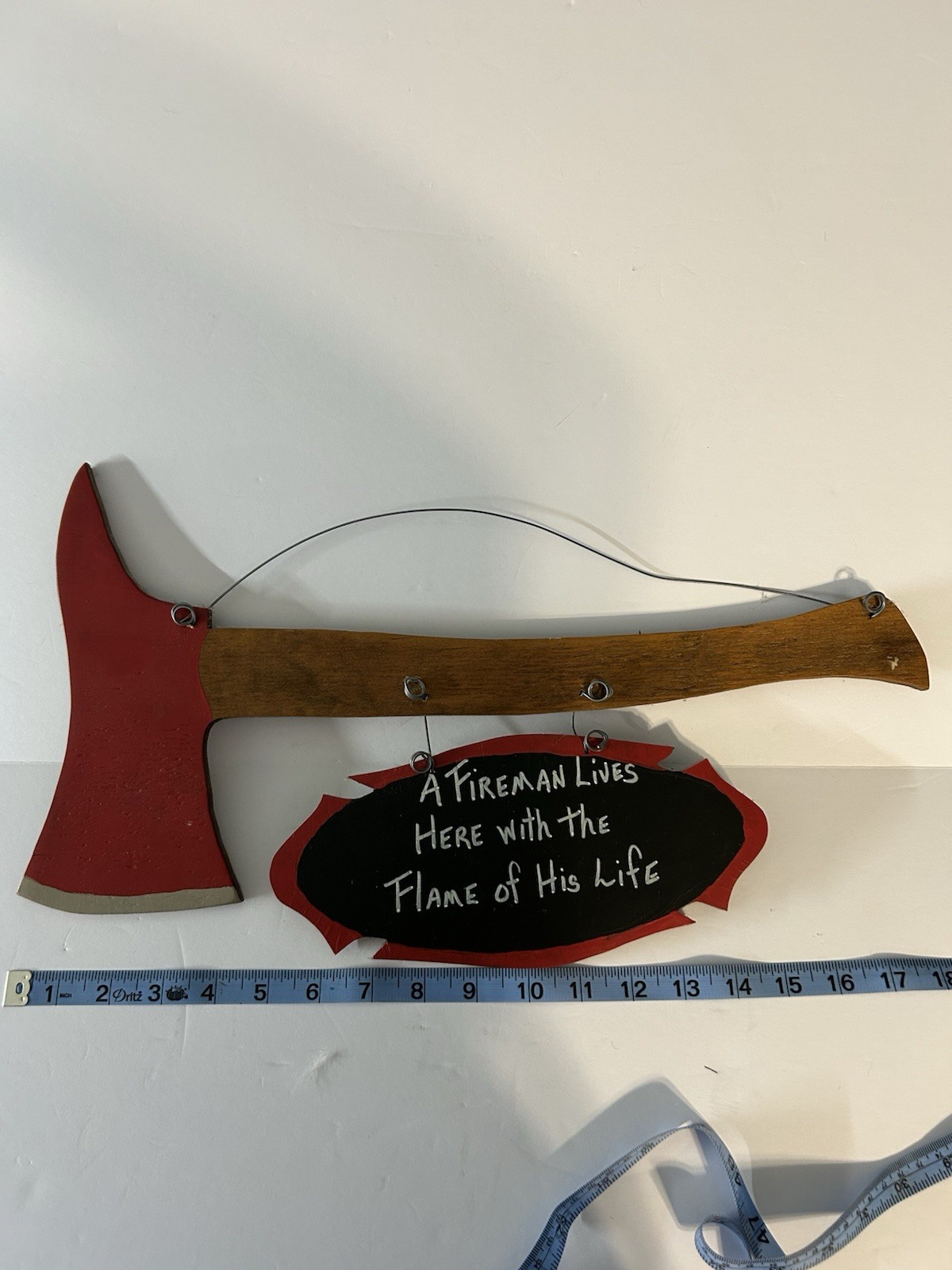Whimsical Fire Axe With Signage Attached
