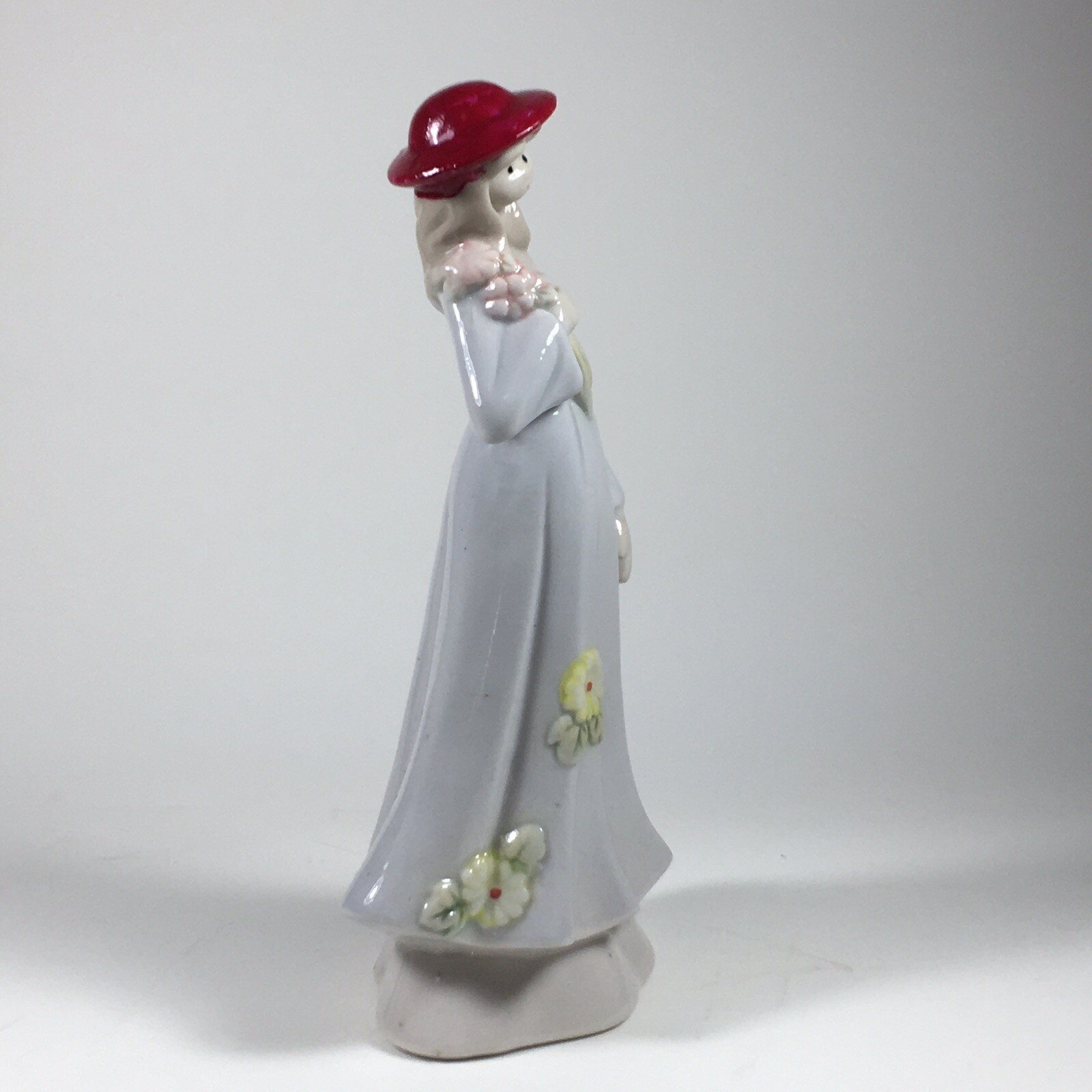 Vintage Ceramic Figurine Woman In Red Hat Holding Flowers 7″ Tall Floral Details