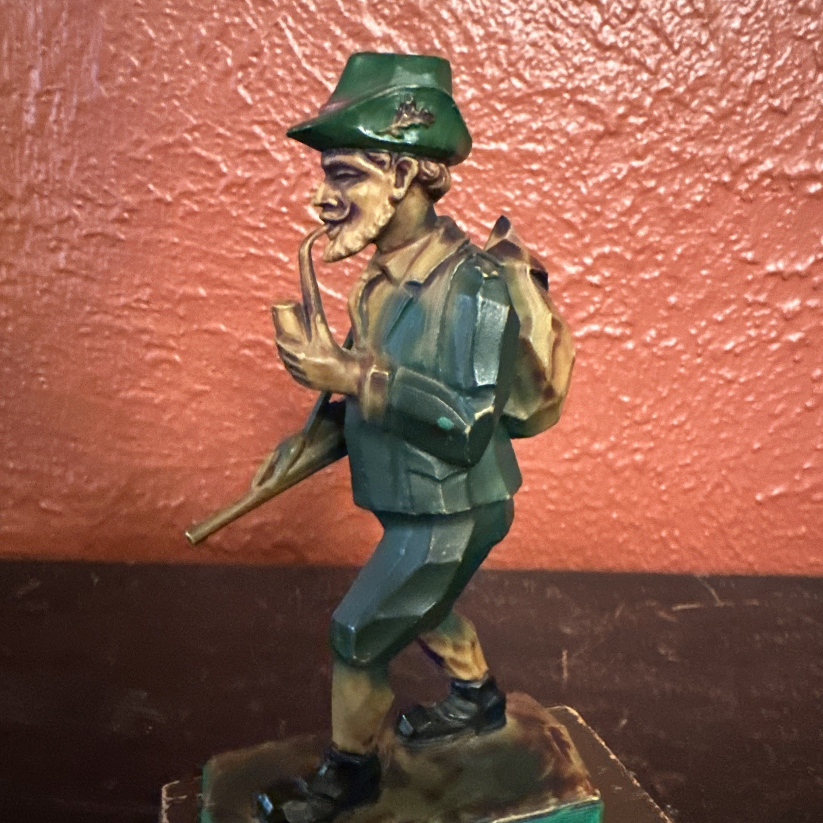 Vintage celluloid Or Resin Hunter Figurine 6″ tall With Gun & Pipe Hand Carved
