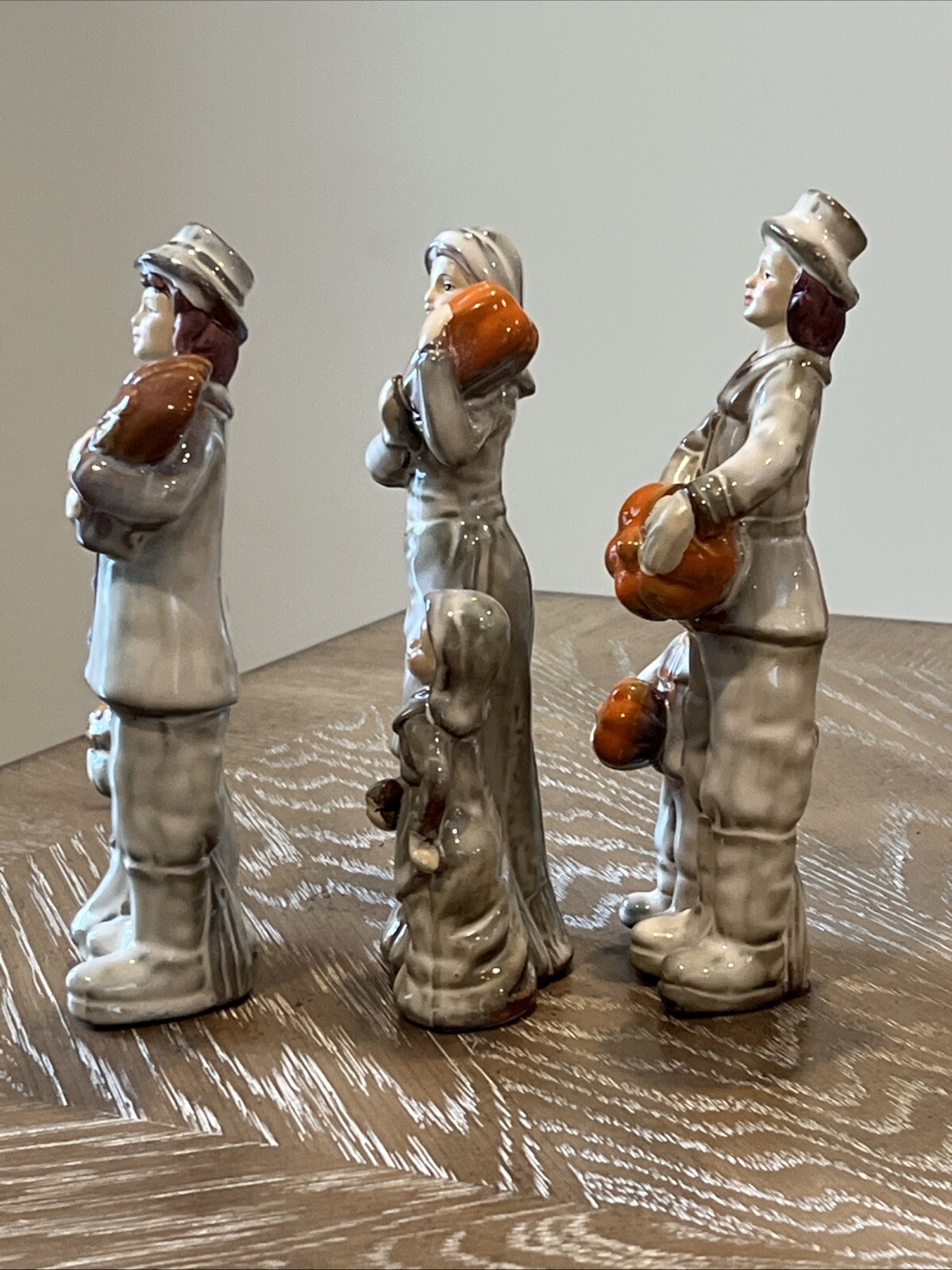 Thanksgiving Porcelain Figurine Pilgrim Family Holding Pumpkin Corn 7” Set Of 3