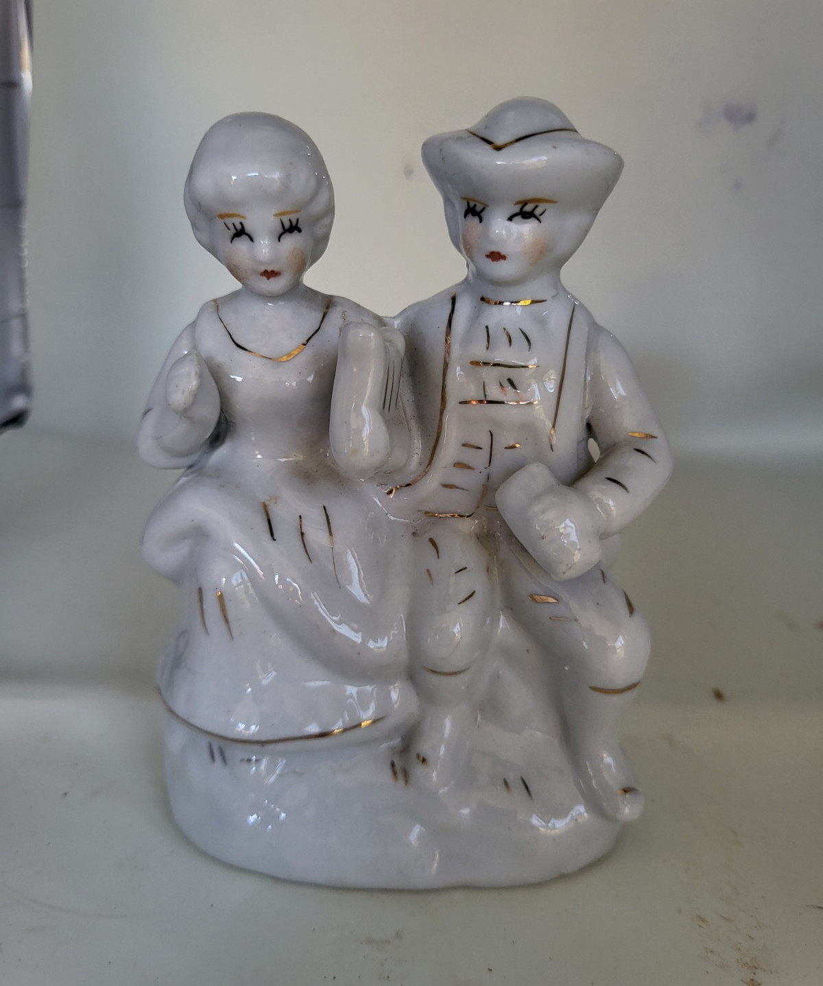 Hand-Painted Ceramic Seated Couple Figurine Man & Woman White Gold Black