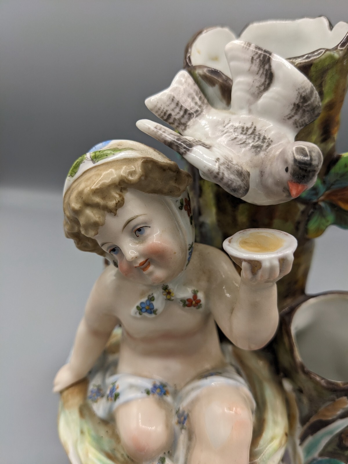 Antique German Conta & Boehme Glazed Porcelain Vase Figurine Baby and the Bird