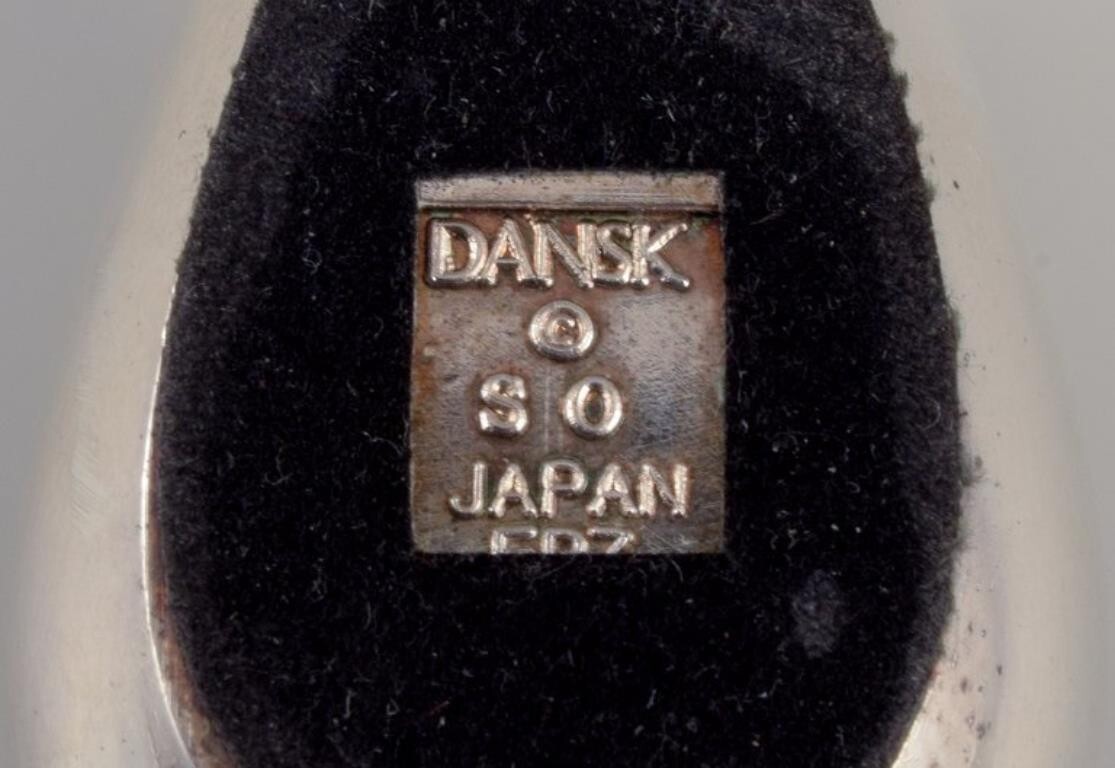 Dansk International Designs Ltd. Small figurine of rabbit in plated silver.