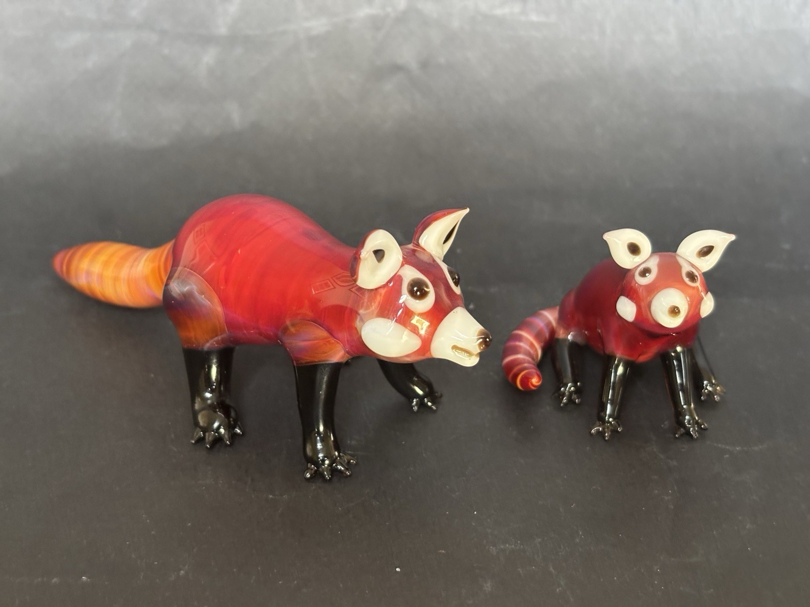 Suellen Fowler Two Glass Red Panda Figurines