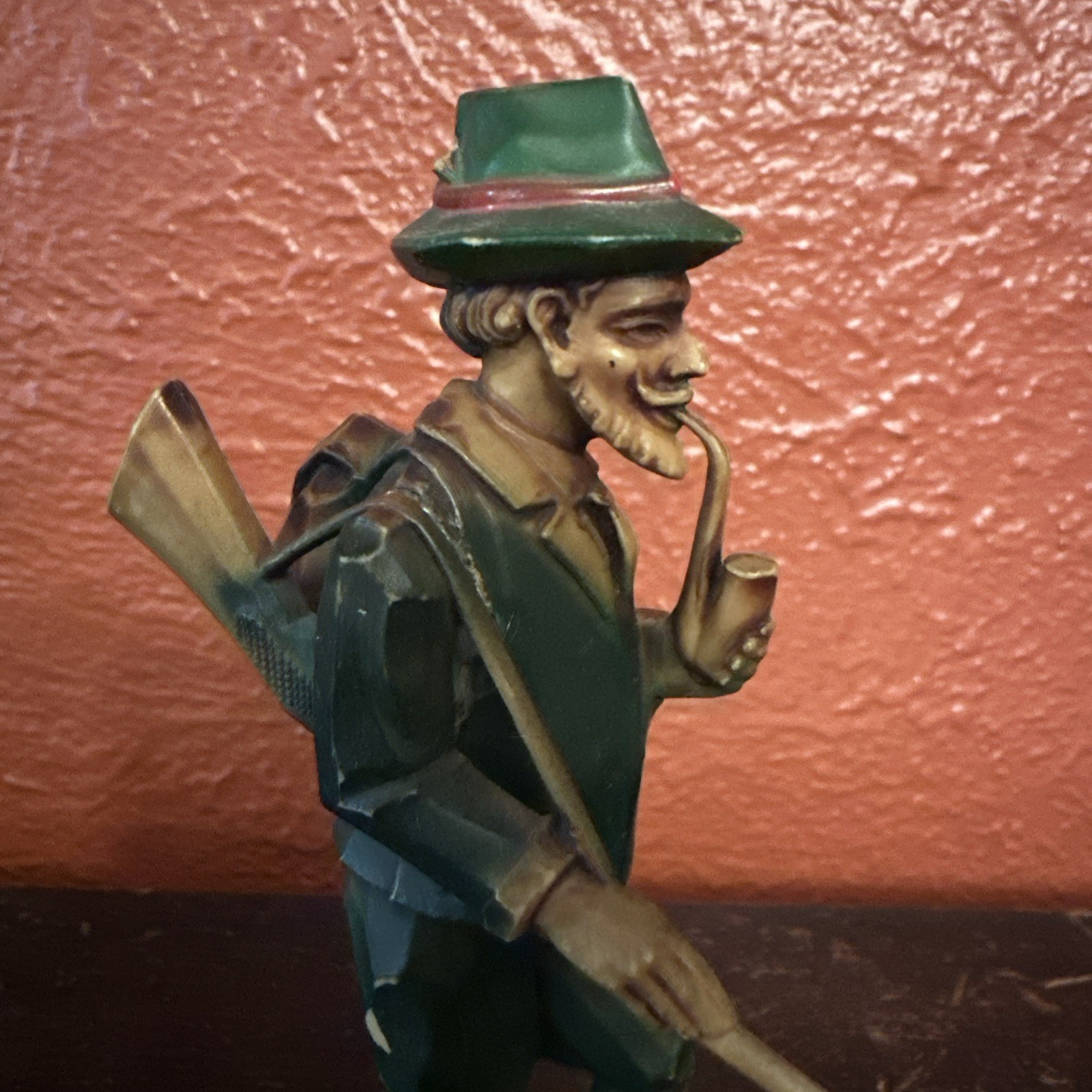 Vintage celluloid Or Resin Hunter Figurine 6″ tall With Gun & Pipe Hand Carved