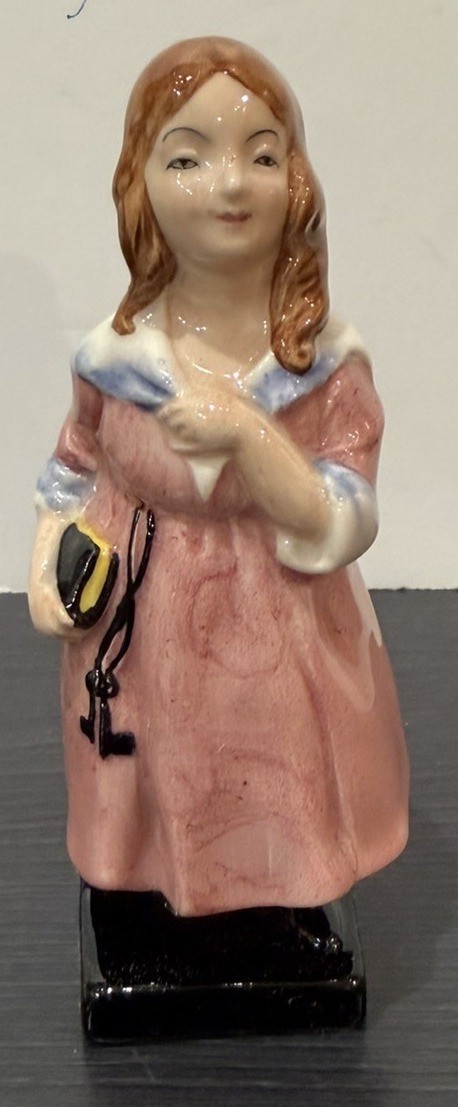 Royal Doulton “Little Nell” figurine, part of the Dickens character series