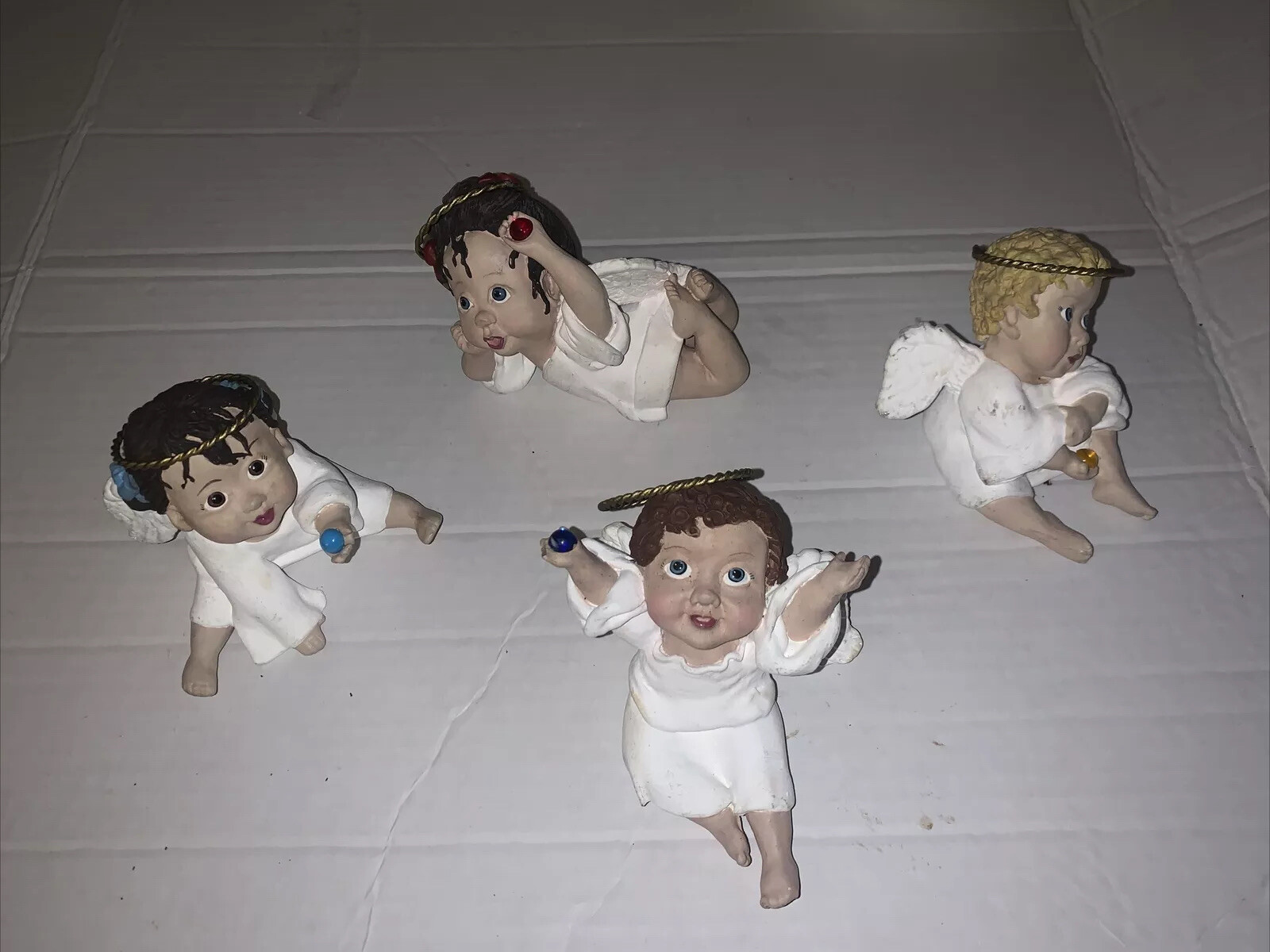 4 Vtg Ethnic ceramic Angel Sandy Doll figurines Birthstone July Dec. Nov Sept